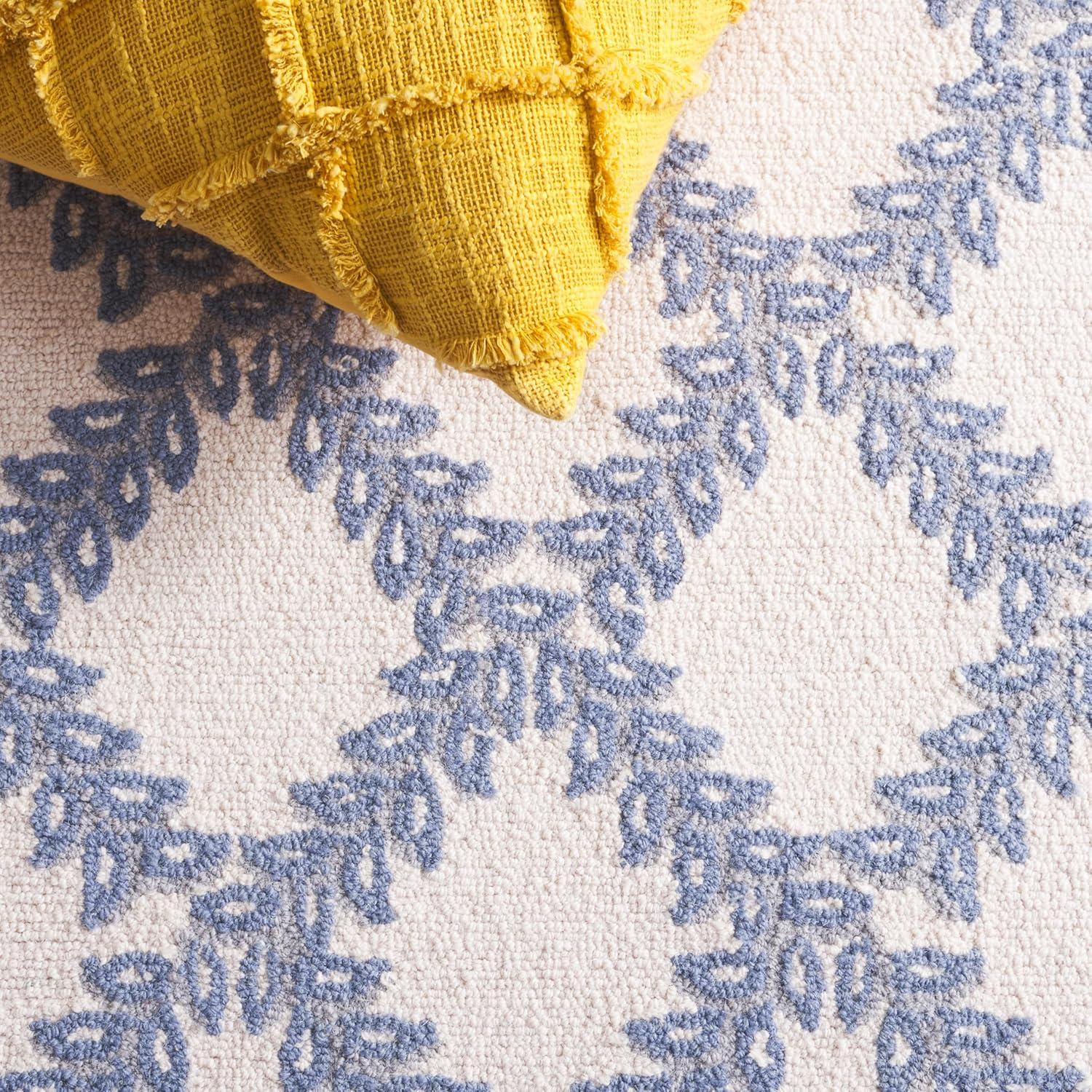 SAFAVIEH Chelsea Alecia Geometric Borders Wool Area Rug, Ivory/Light Blue, 8'9" x 11'9"