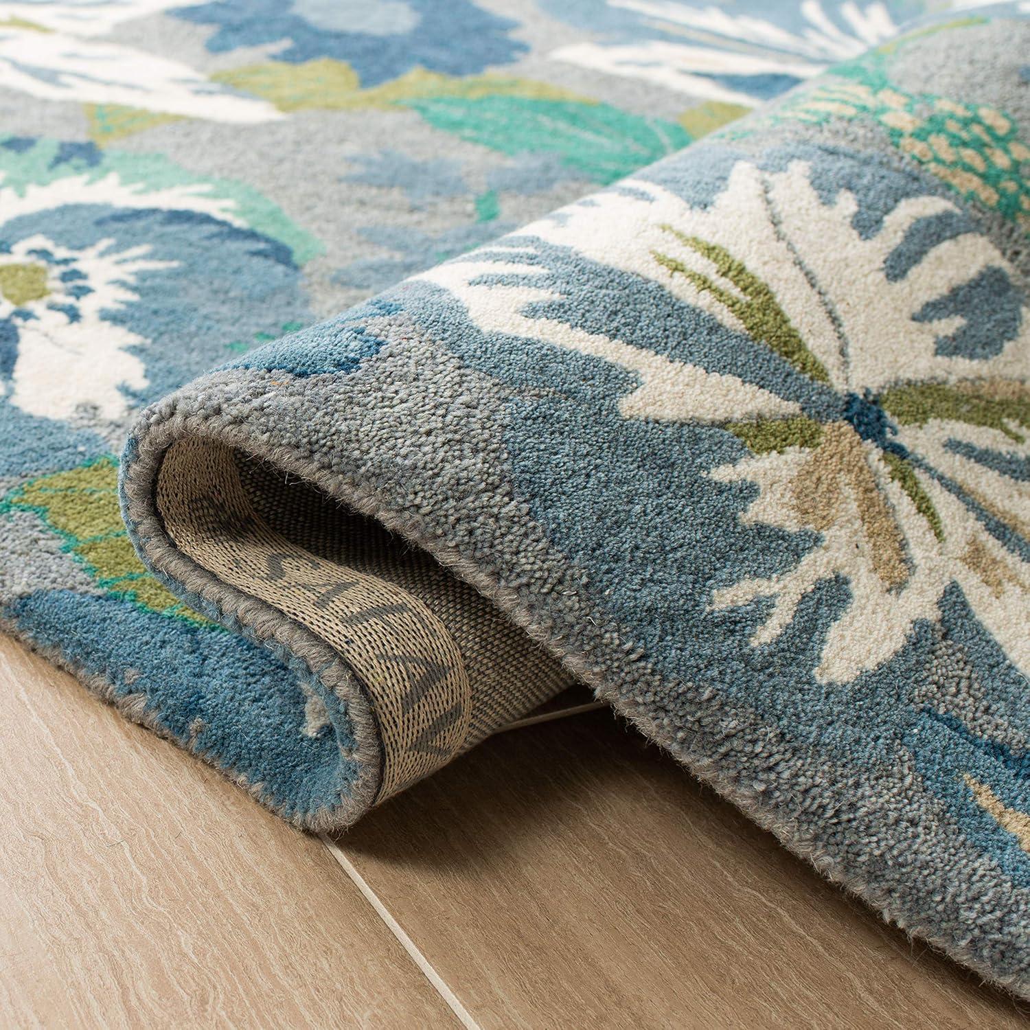 Soho SOH849 Hand Tufted Area Rug - Blue/Multi - 5'x8' - Safavieh.