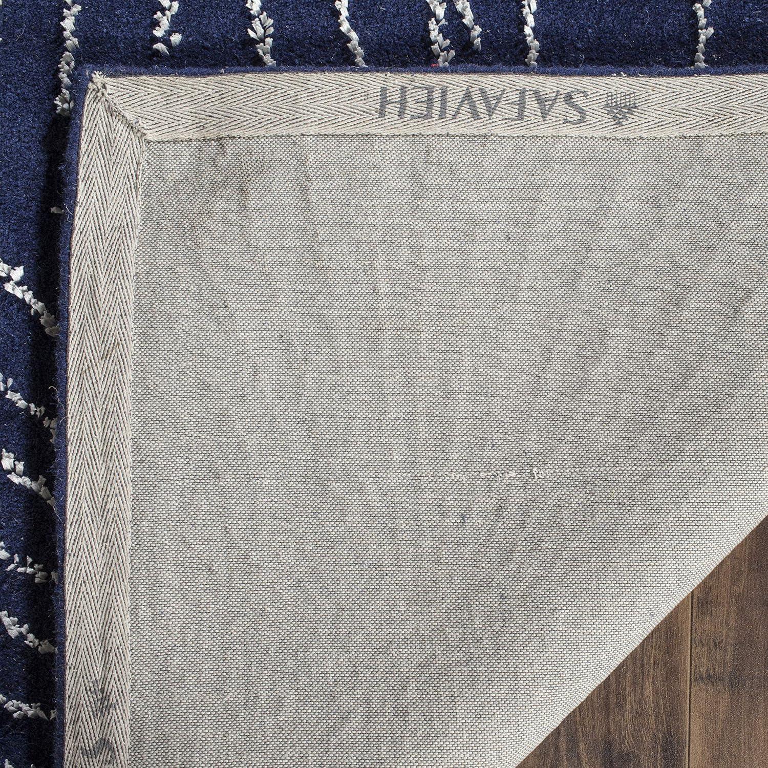 Soho SOH712 Hand Tufted Area Rug - Dark Blue/Ivory - 5'x8' - Safavieh.