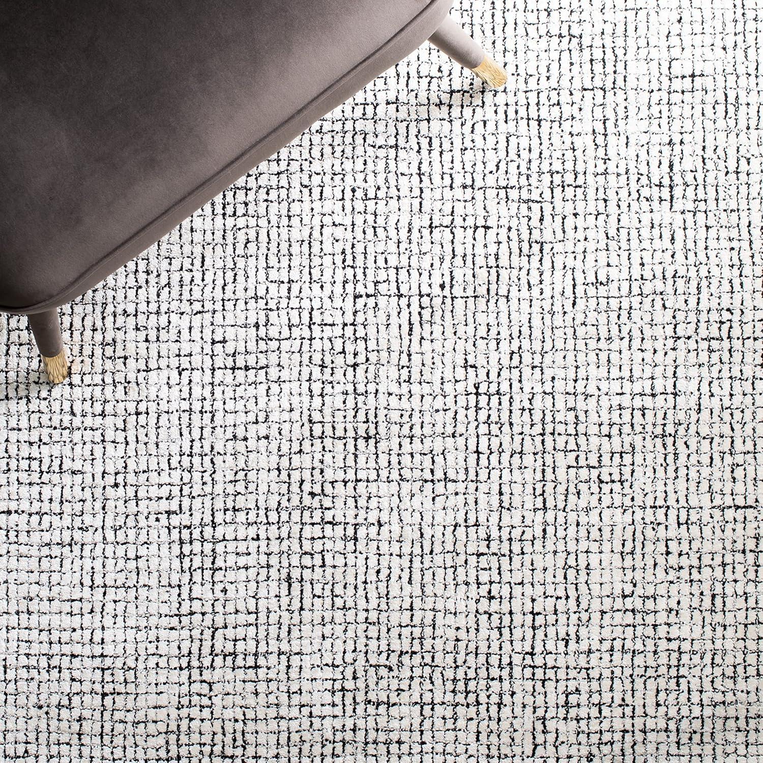 Handmade Abstract Ivory & Black Wool-Viscose 4' x 6' Area Rug