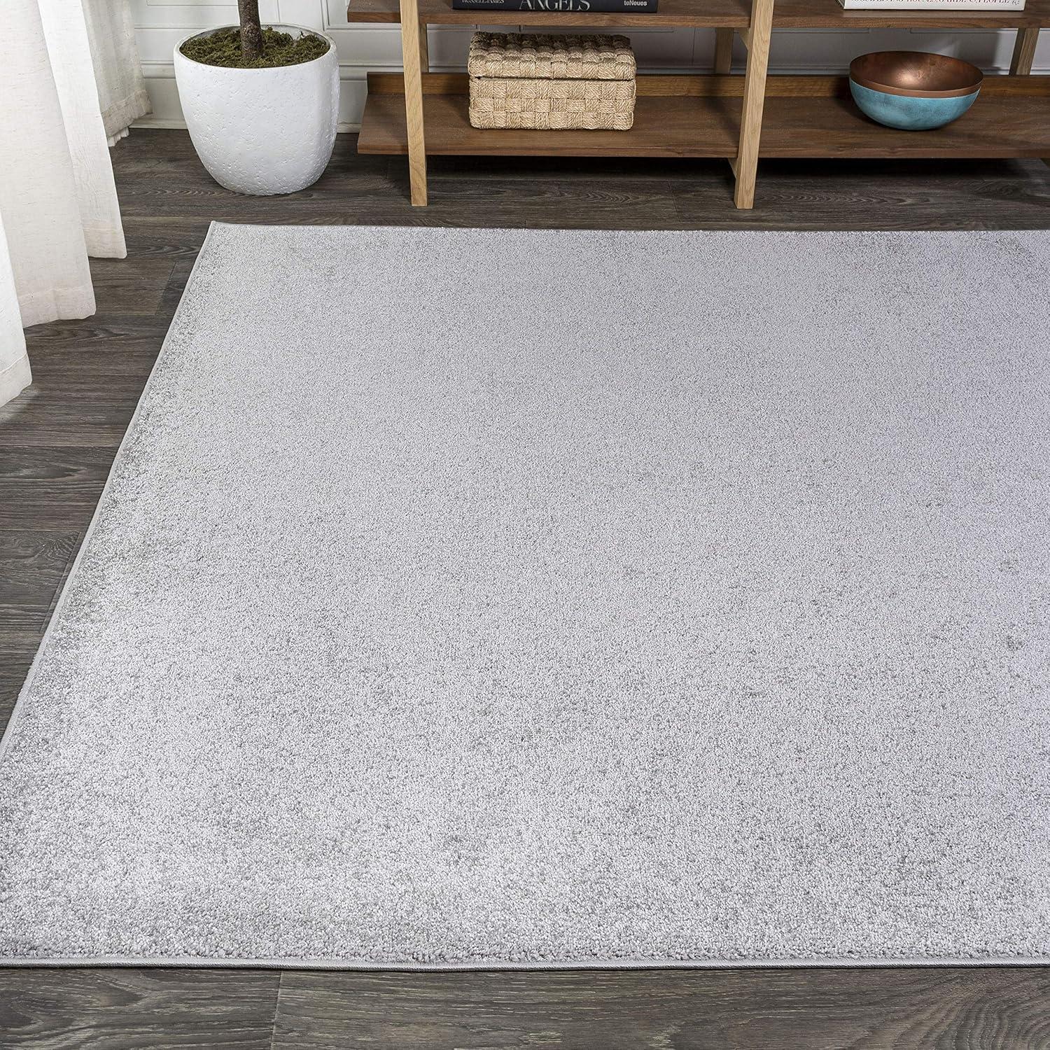 5'x8' Haze Solid Low-Pile Area Rug, Light Gray - JONATHAN Y