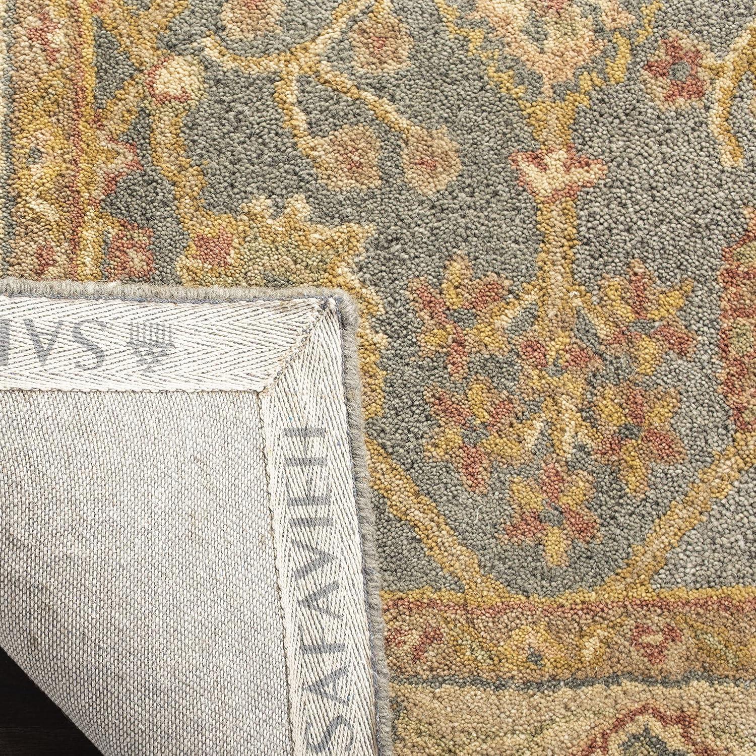 SAFAVIEH Antiquity Chanelle Oriental Wool Area Rug, Blue/Ivory, 9'6" x 13'6"