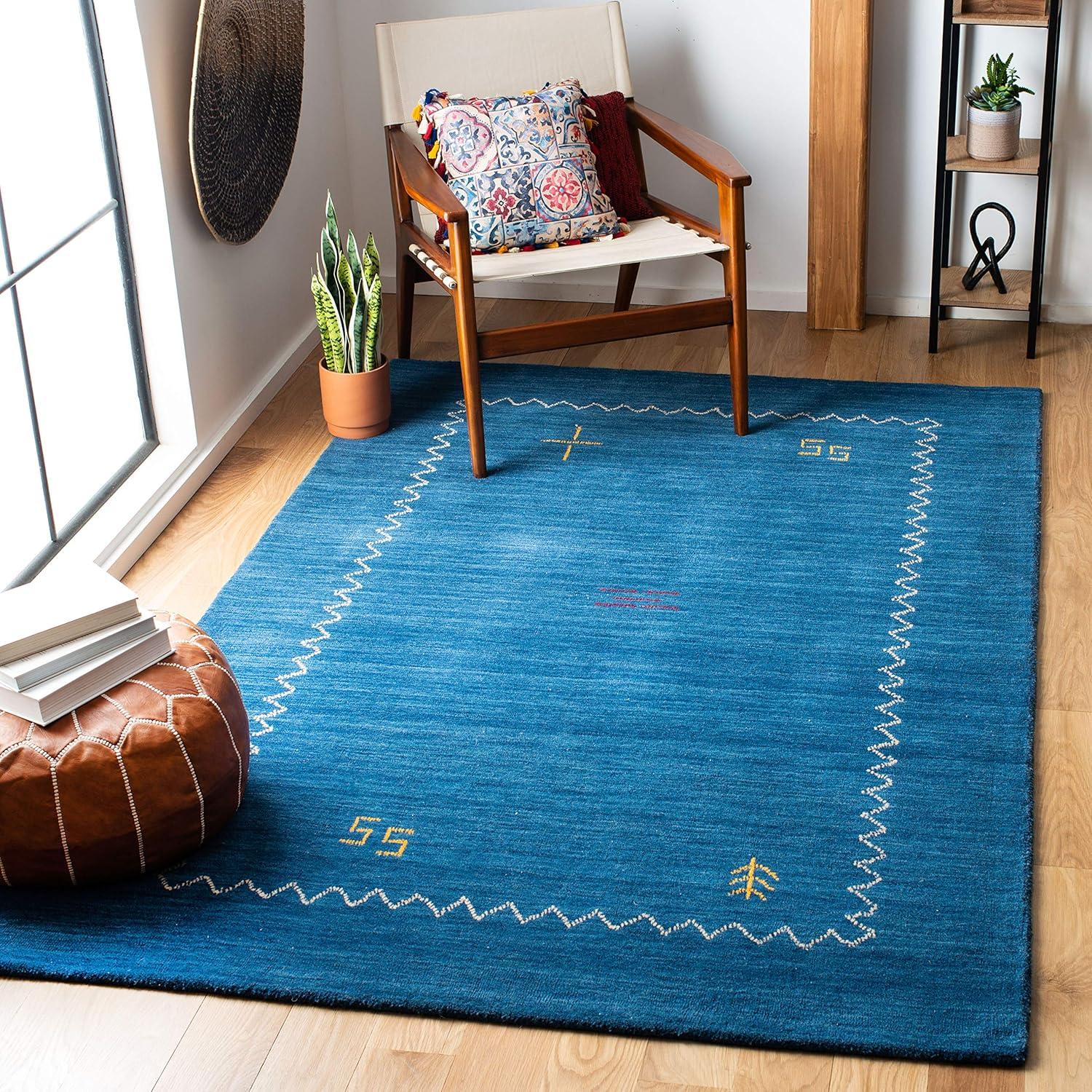 SAFAVIEH Himalaya Yvonne Solid Wool Area Rug, Blue, 11' x 15'