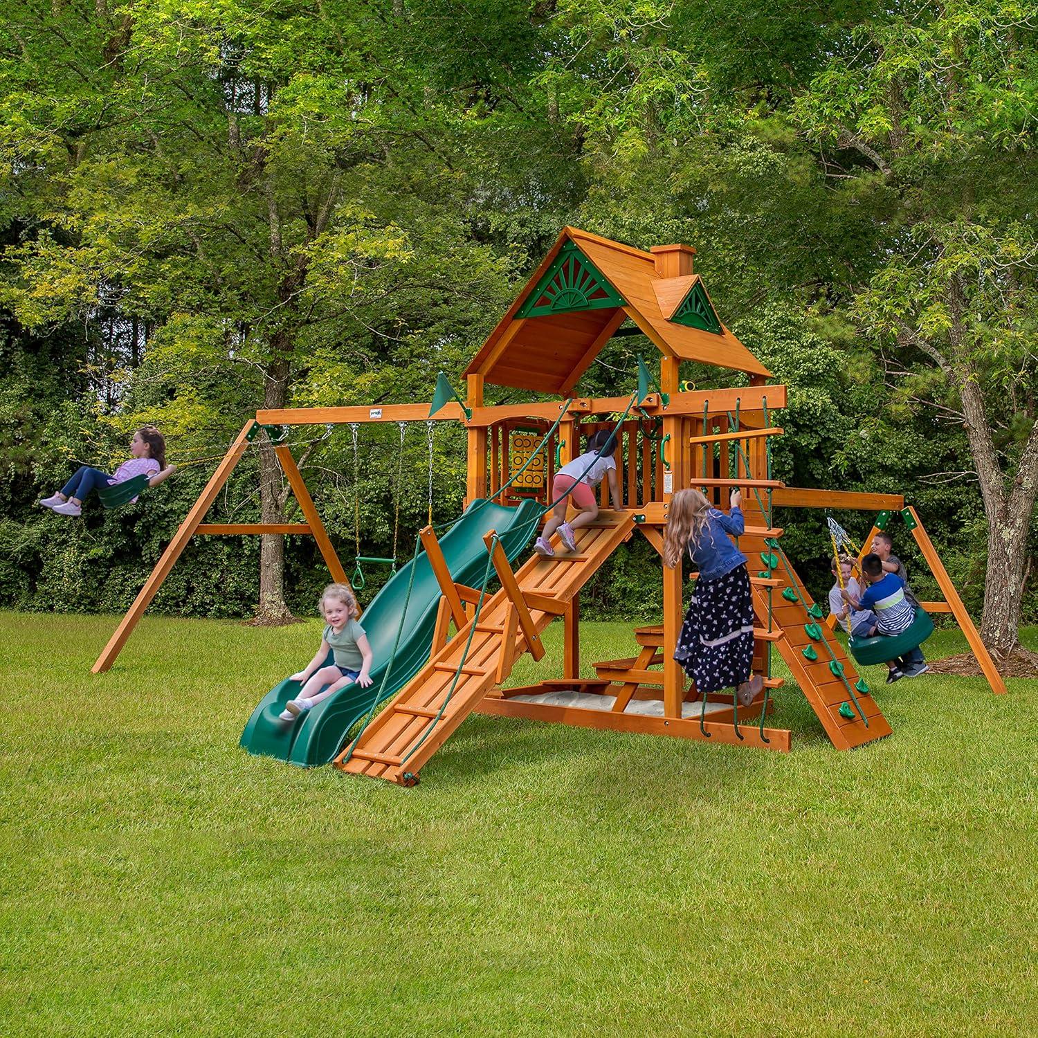 Gorilla Playsets Frontier Wooden Swing Set with Tire Swing, 2 Belt Swing, and Built-in Picnic Table