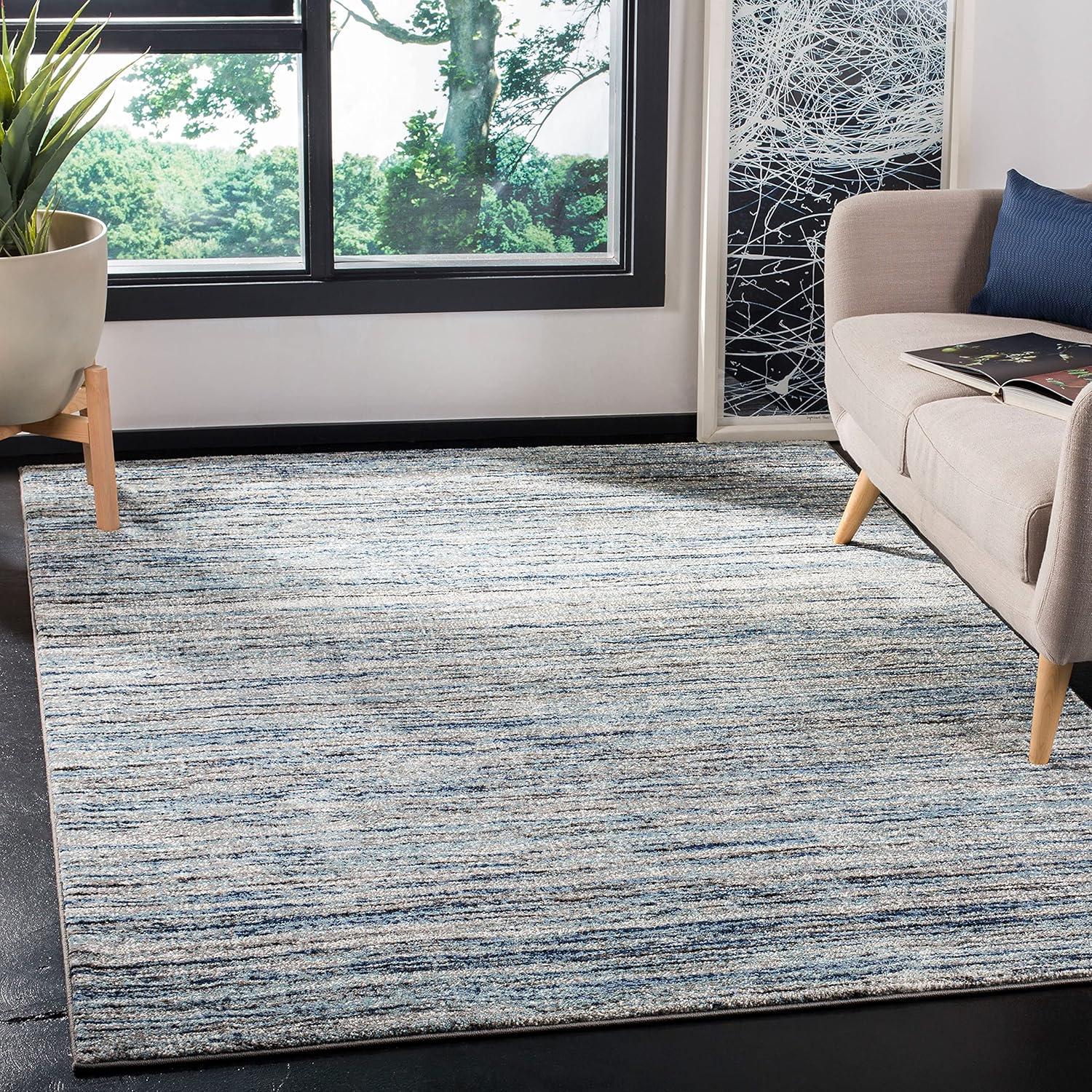 Celestial Blue-Grey Abstract 6'7" x 9' Synthetic Area Rug