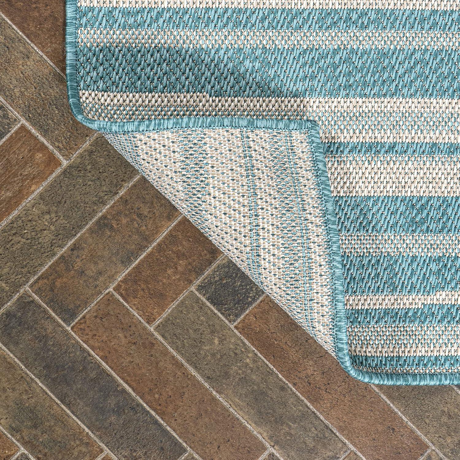 4' x 6' Castara Wavy Stripe Modern Indoor/Outdoor Area Rug, Aqua/Cream - JONATHAN Y