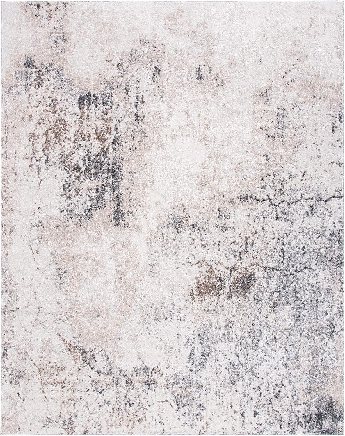 Ivory and Gray Abstract 10' x 14' Stain-Resistant Synthetic Rug