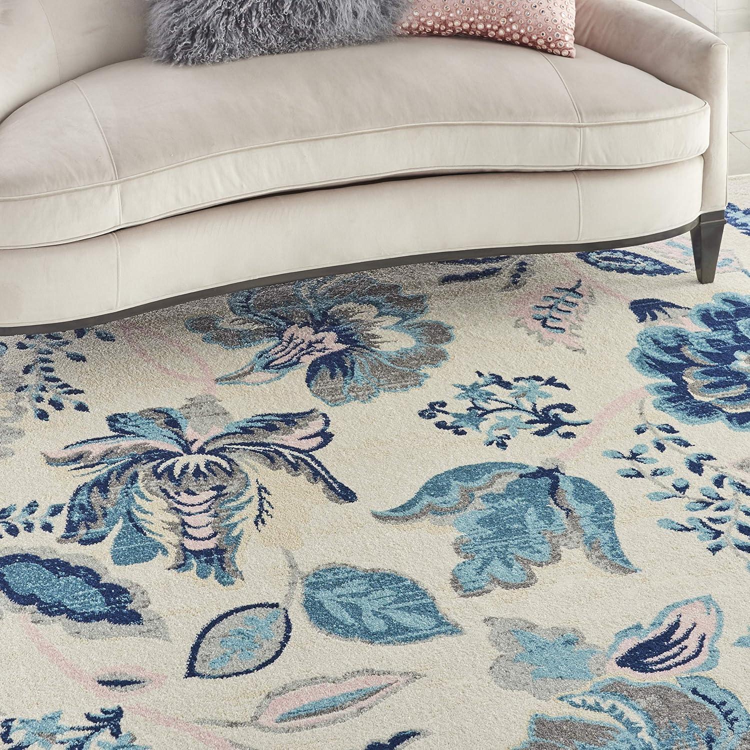 Elegant Ivory and Light Blue Floral 8' x 10' Synthetic Area Rug