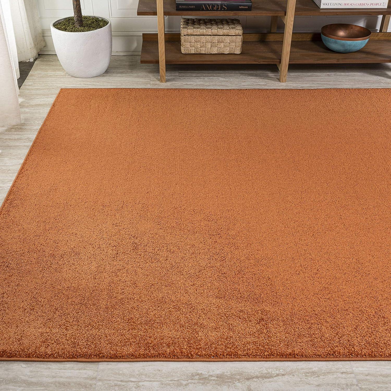 Haze Solid Low-Pile Orange 10 ft. x 14 ft. Area rug -JONATHAN Y