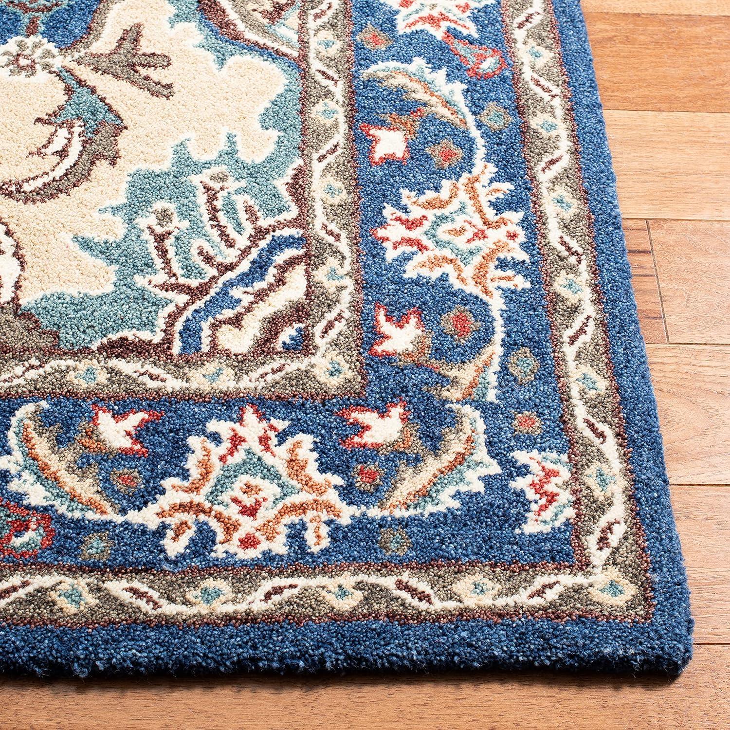 Antiquity AT520 Hand Tufted Area Rug - Blue/Ivory - 5'x8' - Safavieh.