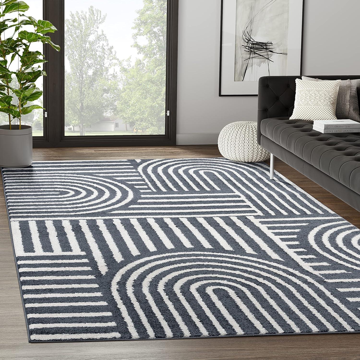 6' x 9' Black and Cream Striped Synthetic Area Rug