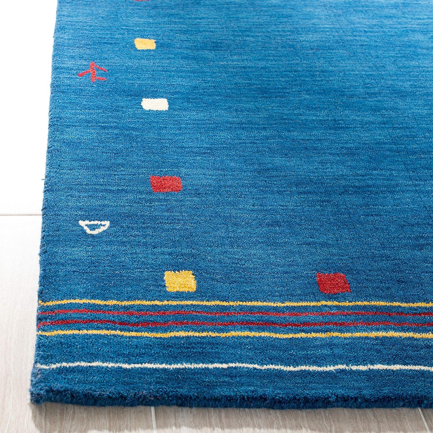 SAFAVIEH Himalaya Charmaine Solid Wool Area Rug, Blue, 6' x 9'