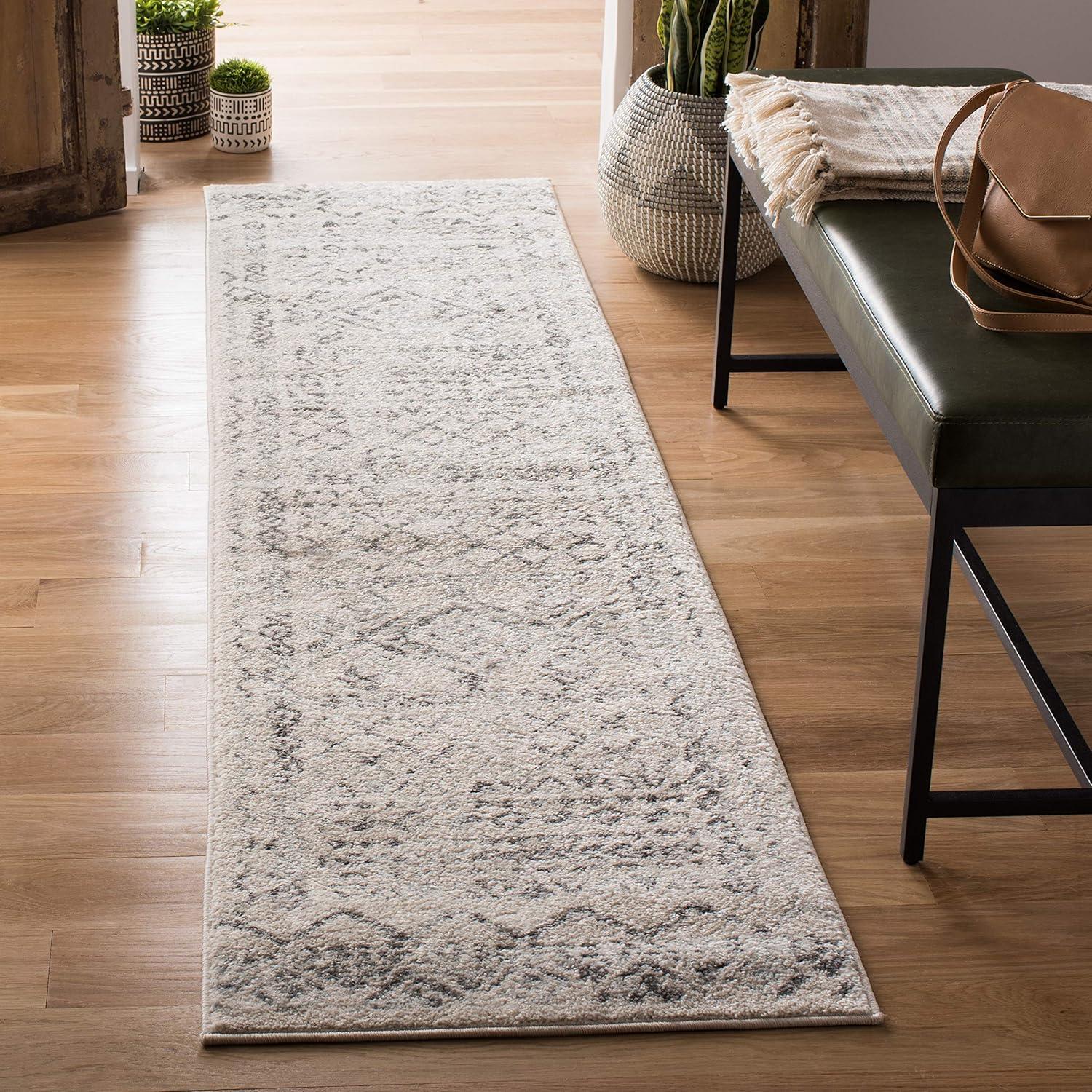 Ivory Geometric Synthetic 2' x 11' Easy-Care Runner Rug