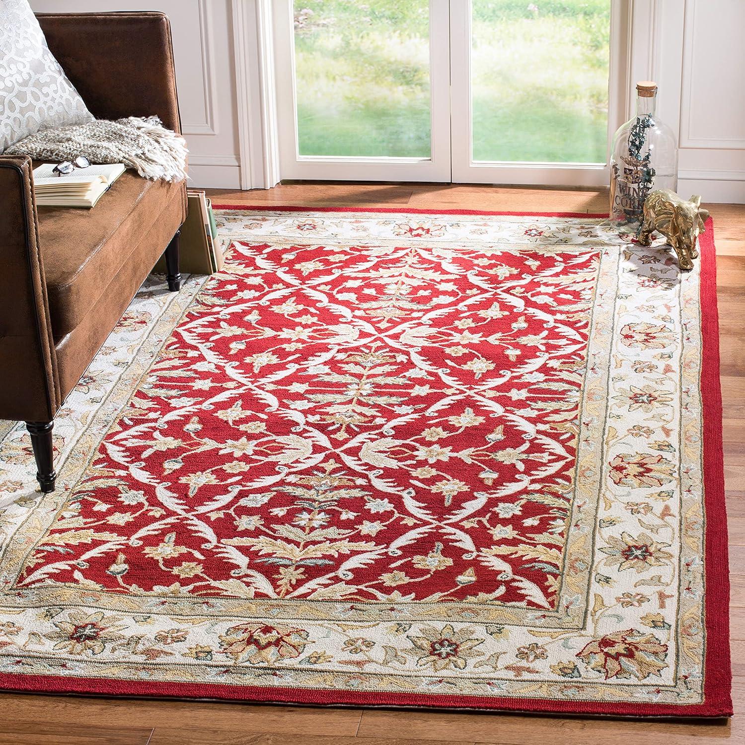 Red and Ivory Hand-Hooked Synthetic 6' x 9' Area Rug