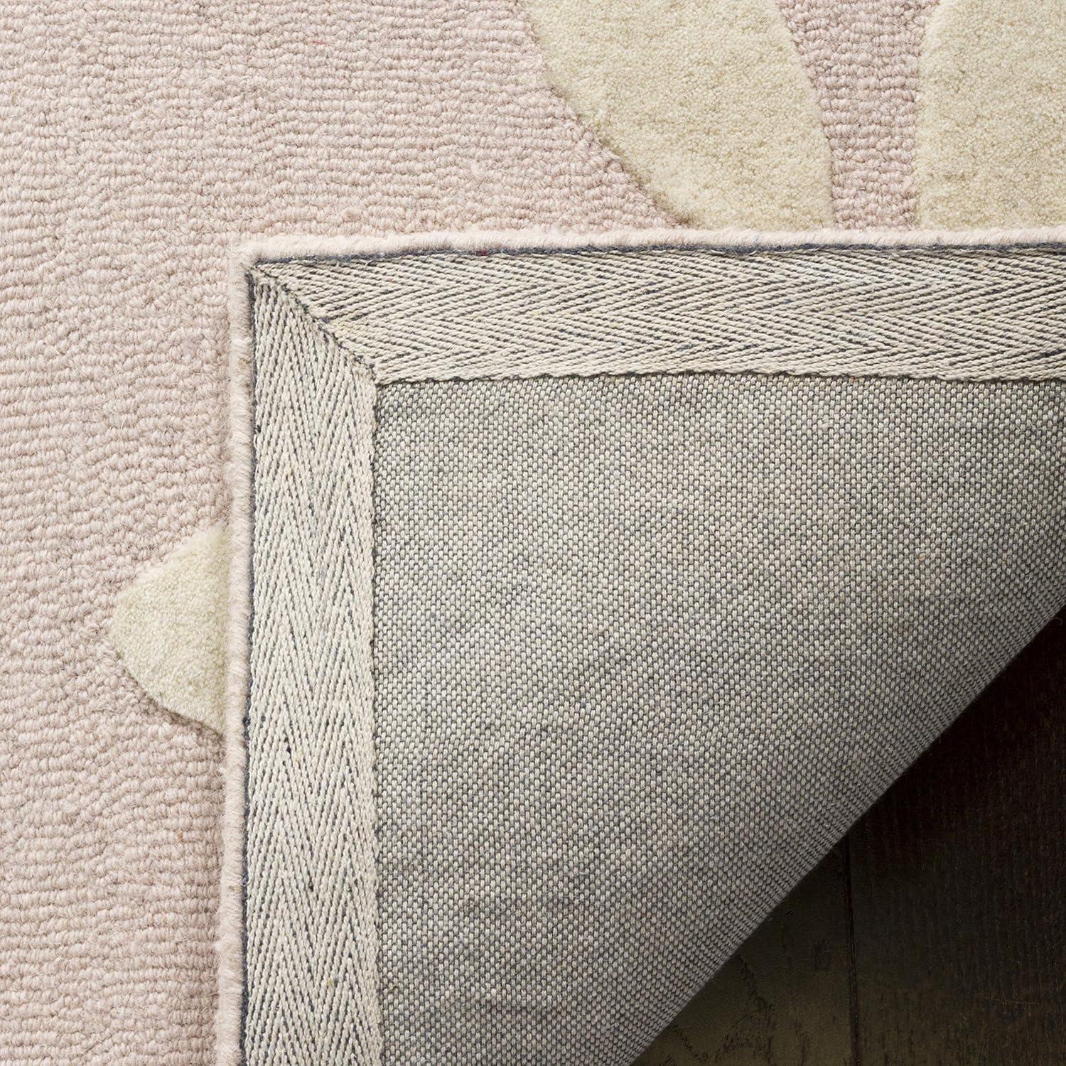Safavieh Kids SFK914 Hand Tufted Area Rug - Pink/Ivory - 5'x5' - Safavieh.