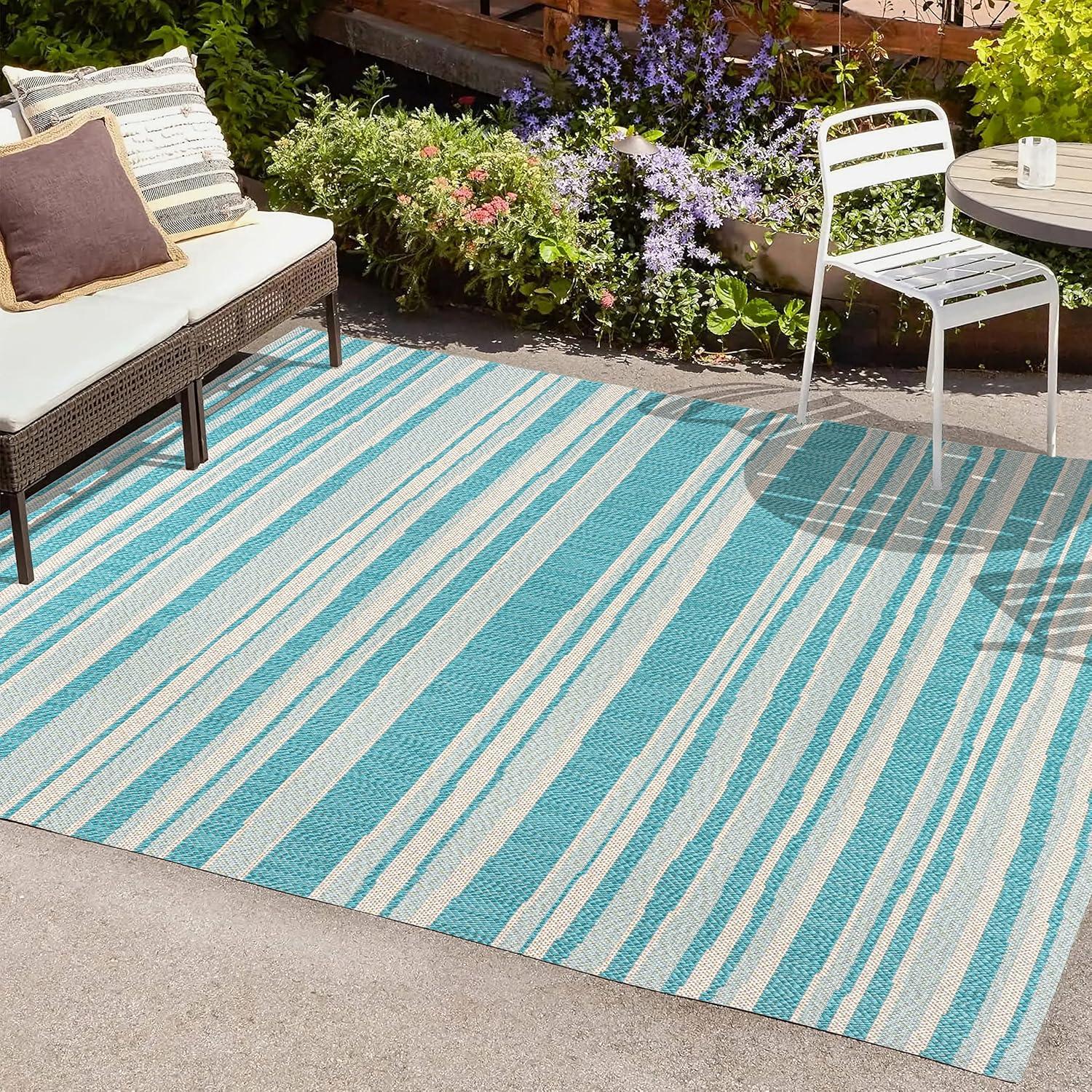 4' x 6' Castara Wavy Stripe Modern Indoor/Outdoor Area Rug, Aqua/Cream - JONATHAN Y