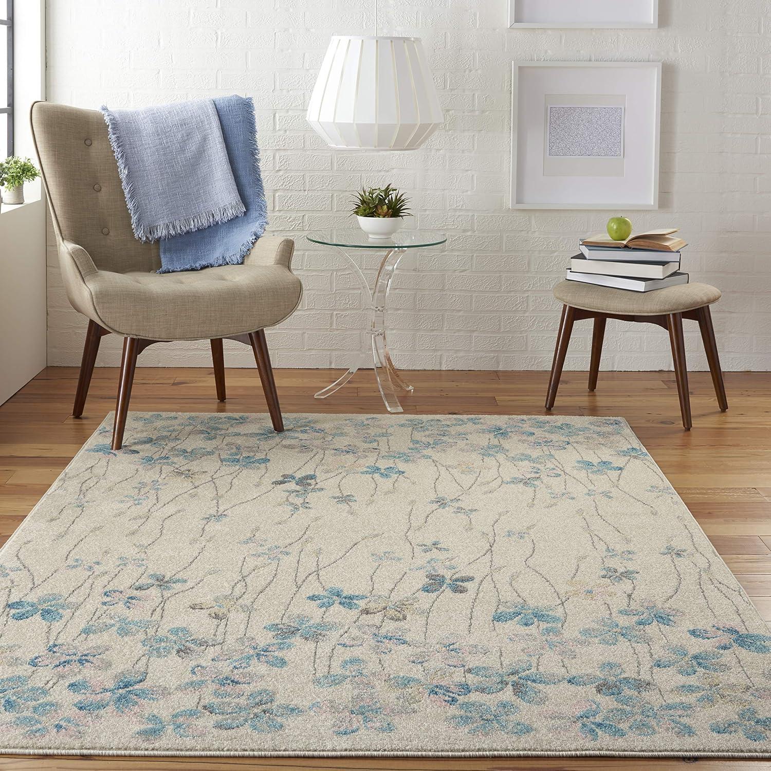 Ivory Floral Bliss Synthetic 5'3" x 7'3" Round Area Rug