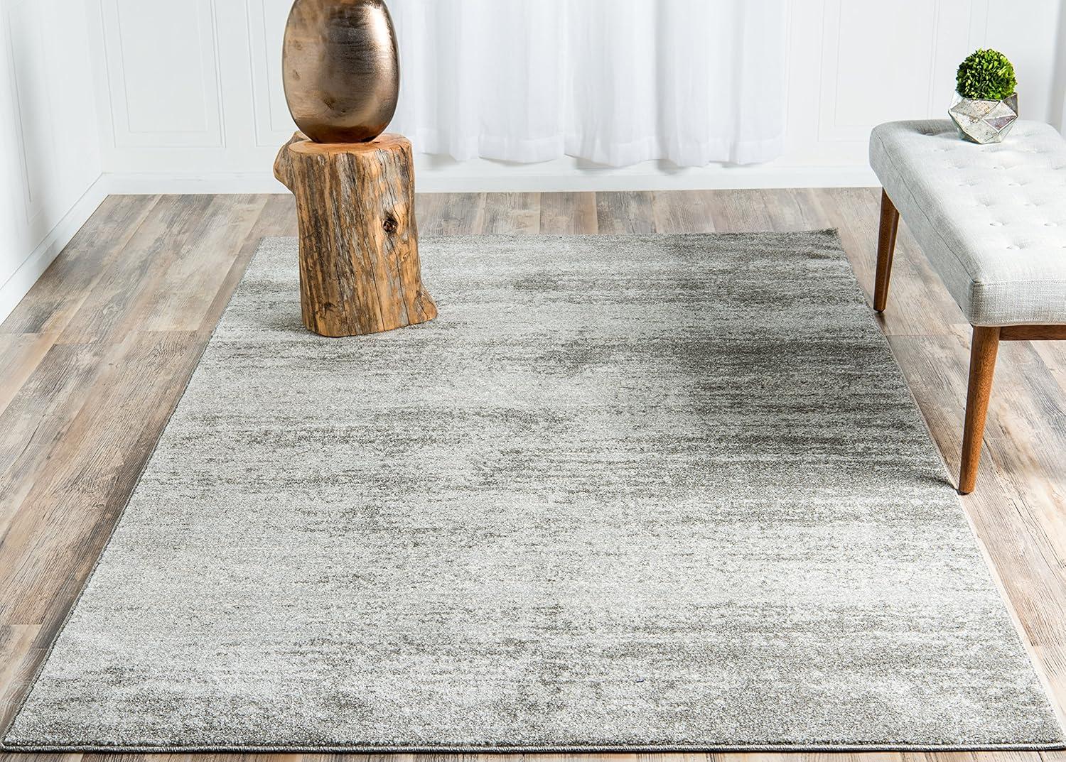 Elysian Gray Solid Synthetic 9' x 12' Easy-Care Area Rug