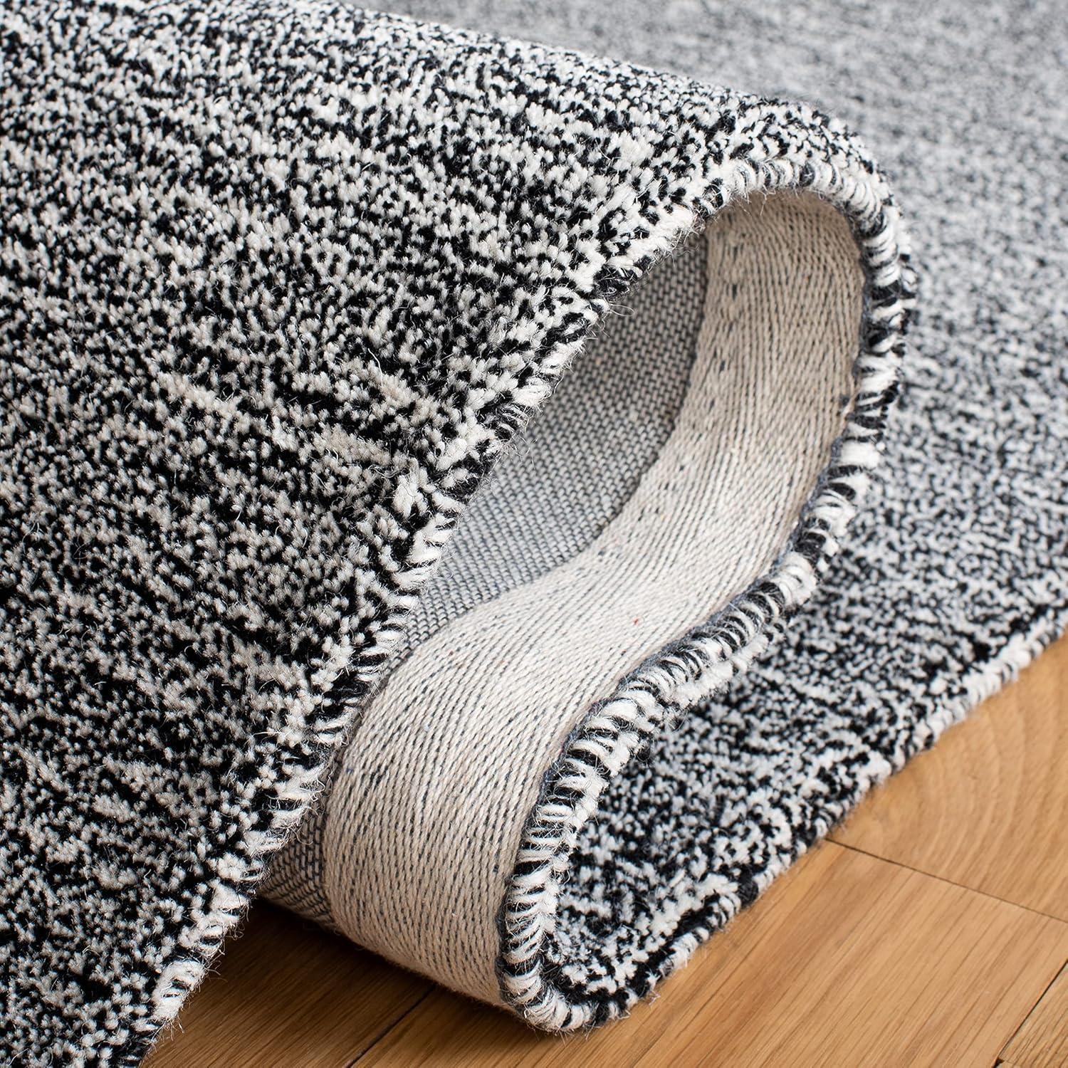 Metro MET867 Hand Tufted Indoor Area Rug - Black/Ivory - 5'x8' - Safavieh