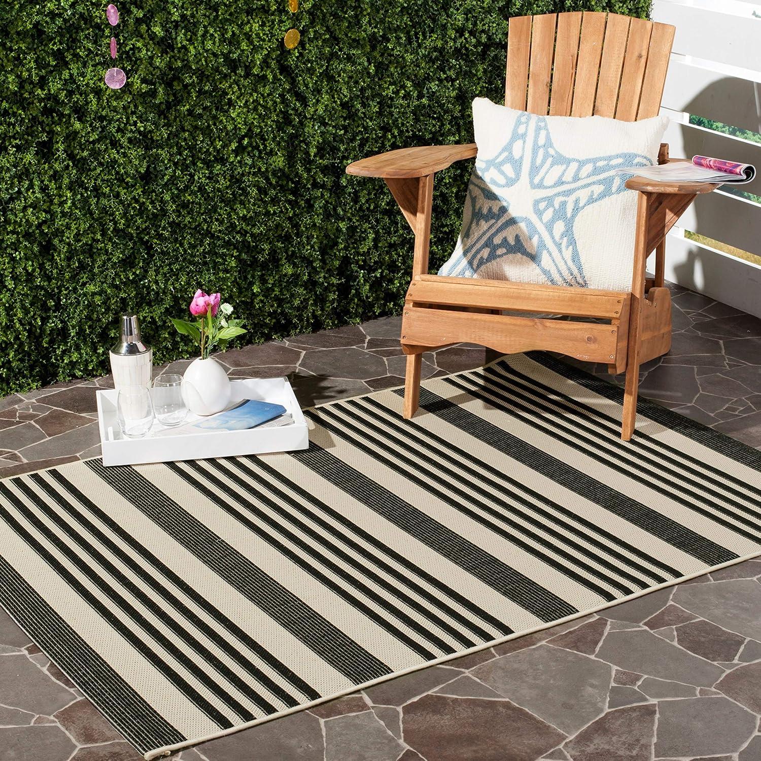 Courtyard Black Synthetic 27" Indoor/Outdoor Stain-Resistant Runner Rug