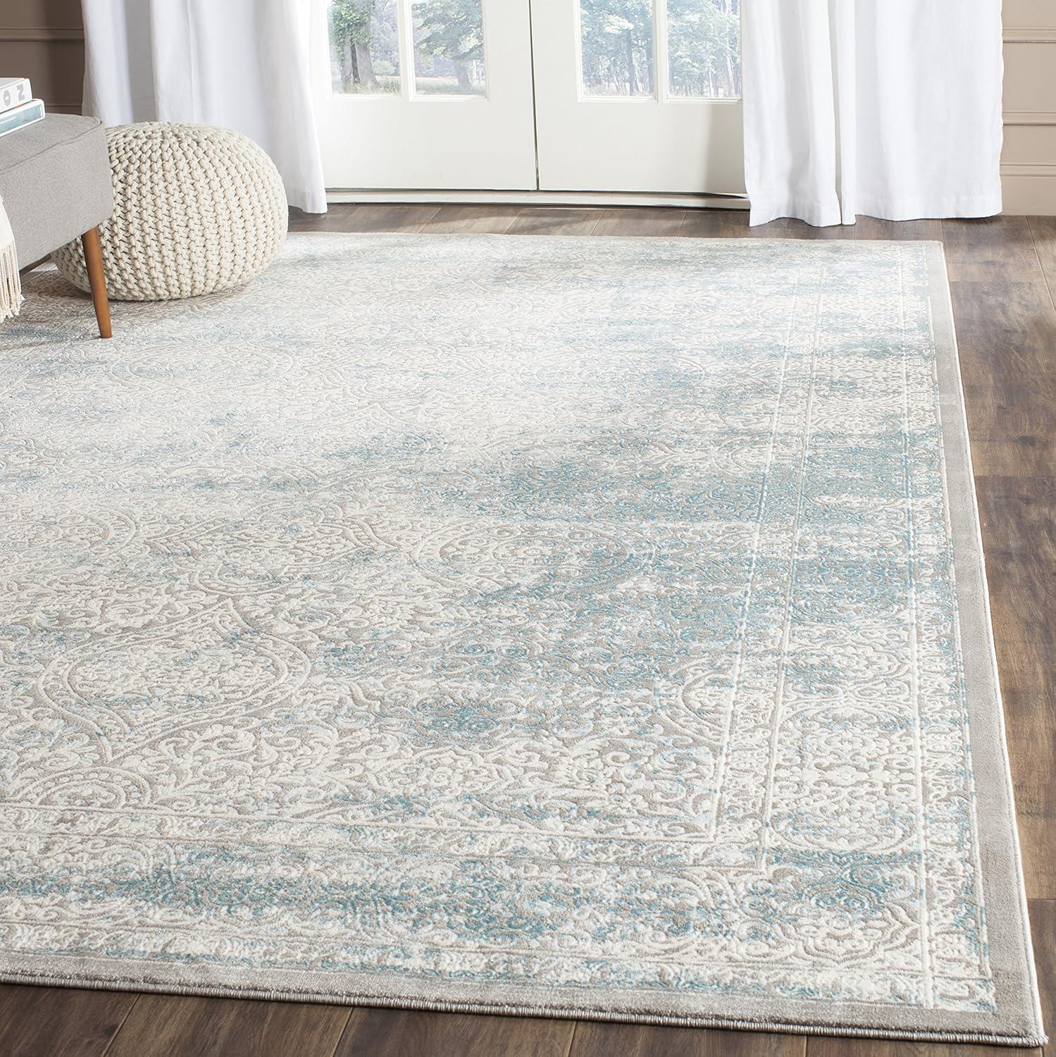 Elysian Ivory & Turquoise 9' x 12' Synthetic Reversible Area Rug