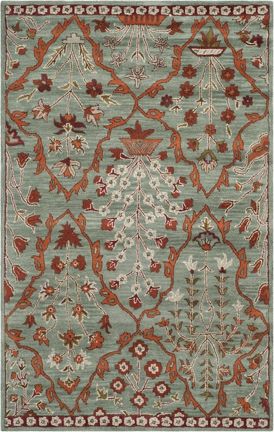 Wyndham WYD206 Hand Tufted Area Rug - Blue/Rust - 5'x8' - Safavieh.