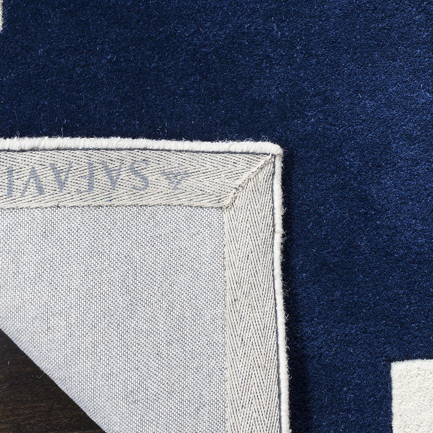 Handmade Blue and Ivory Wool 6' x 9' Geometric Area Rug