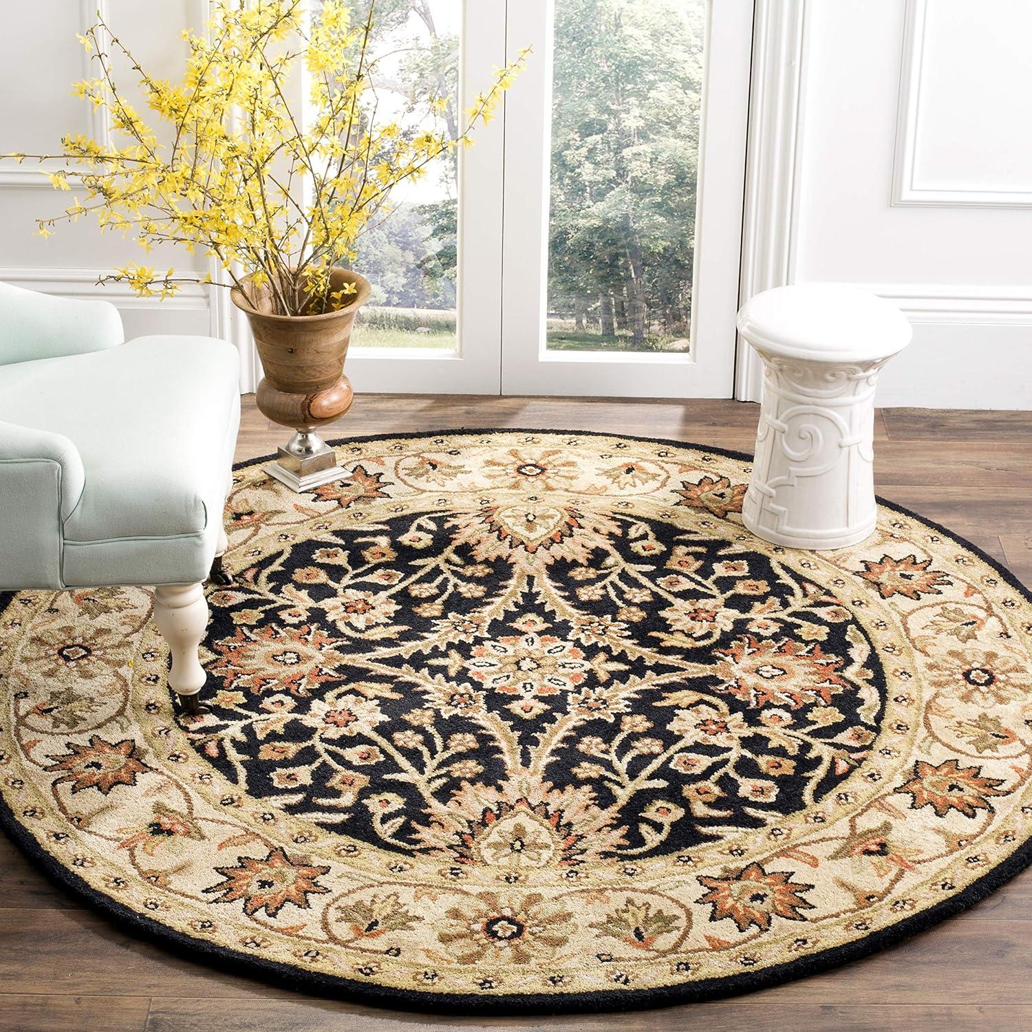 Handmade Black and Ivory Round Wool Tufted Area Rug