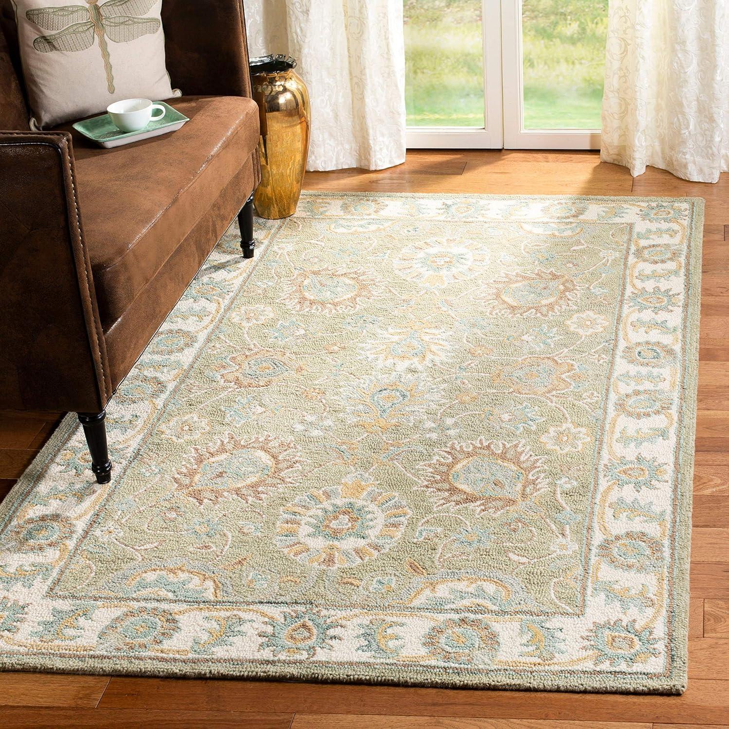 Handmade Ivory and Aqua Floral Wool Area Rug 5' x 8'