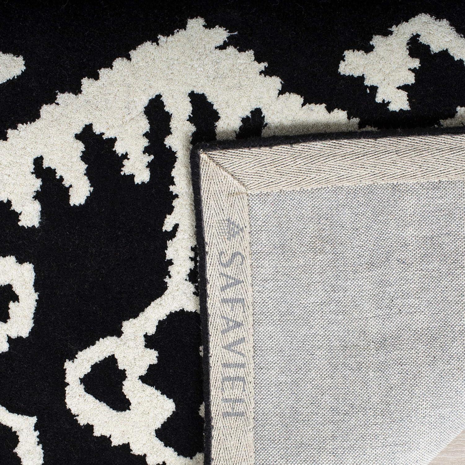 Wyndham WYD323 Hand Tufted Indoor Area Rug - Black/Ivory - 6'x9' - Safavieh.
