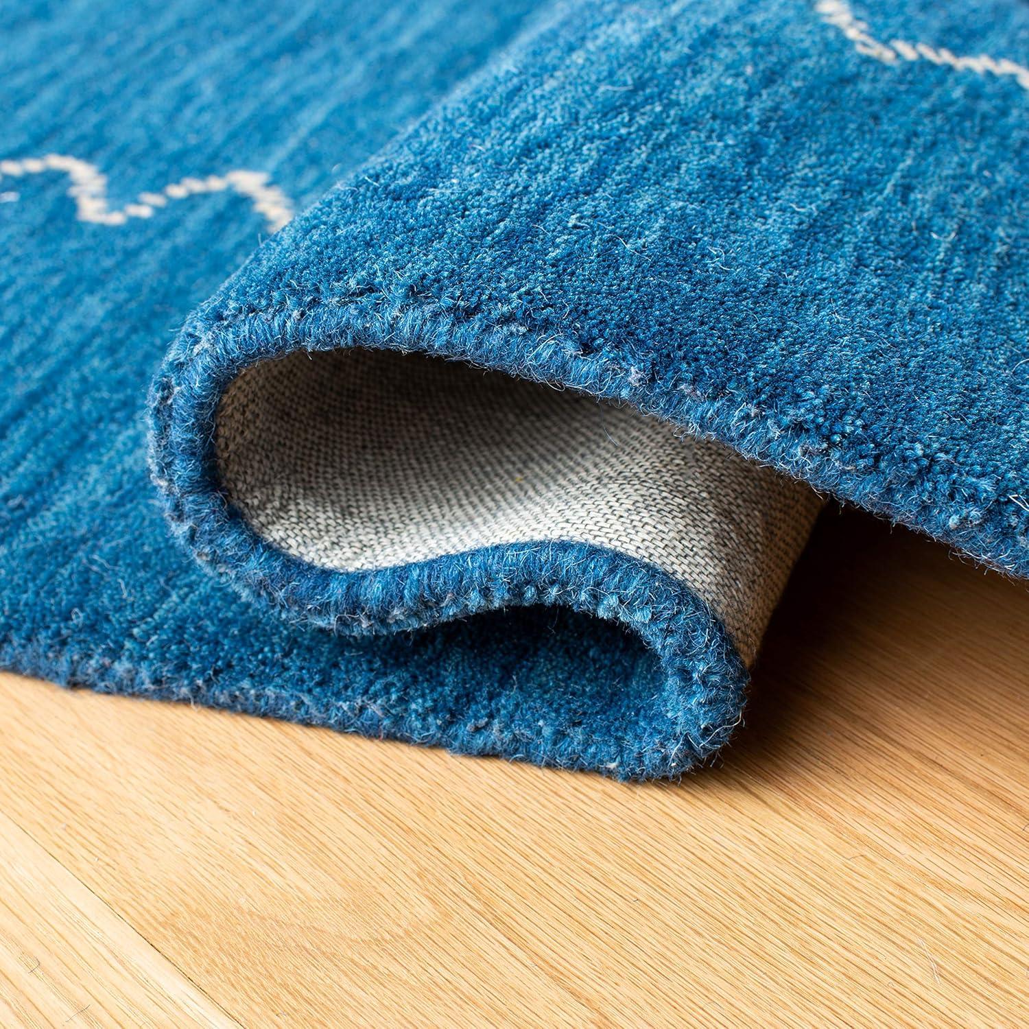 SAFAVIEH Himalaya Yvonne Solid Wool Area Rug, Blue, 11' x 15'
