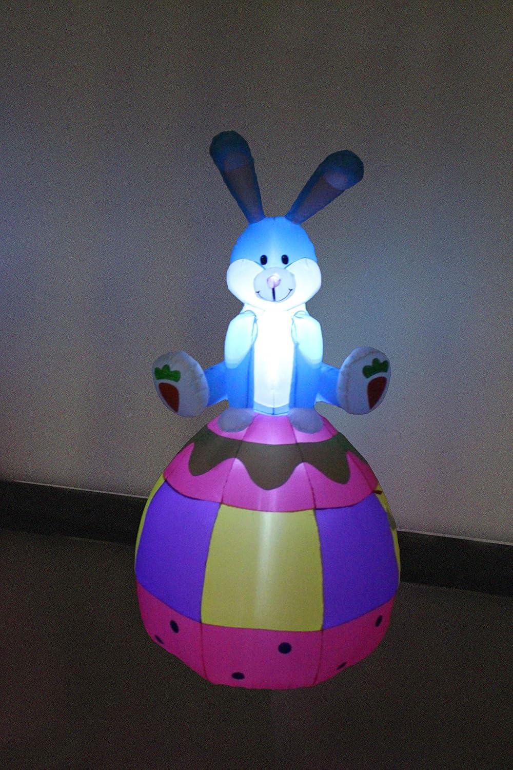 The Holiday Aisle® 6 Foot Tall Happy Easter Lighted Inflatable Bunny Rabbit Sitting on Easter Egg Indoor / Outdoor Blow Up Yard Decoration Inflatable