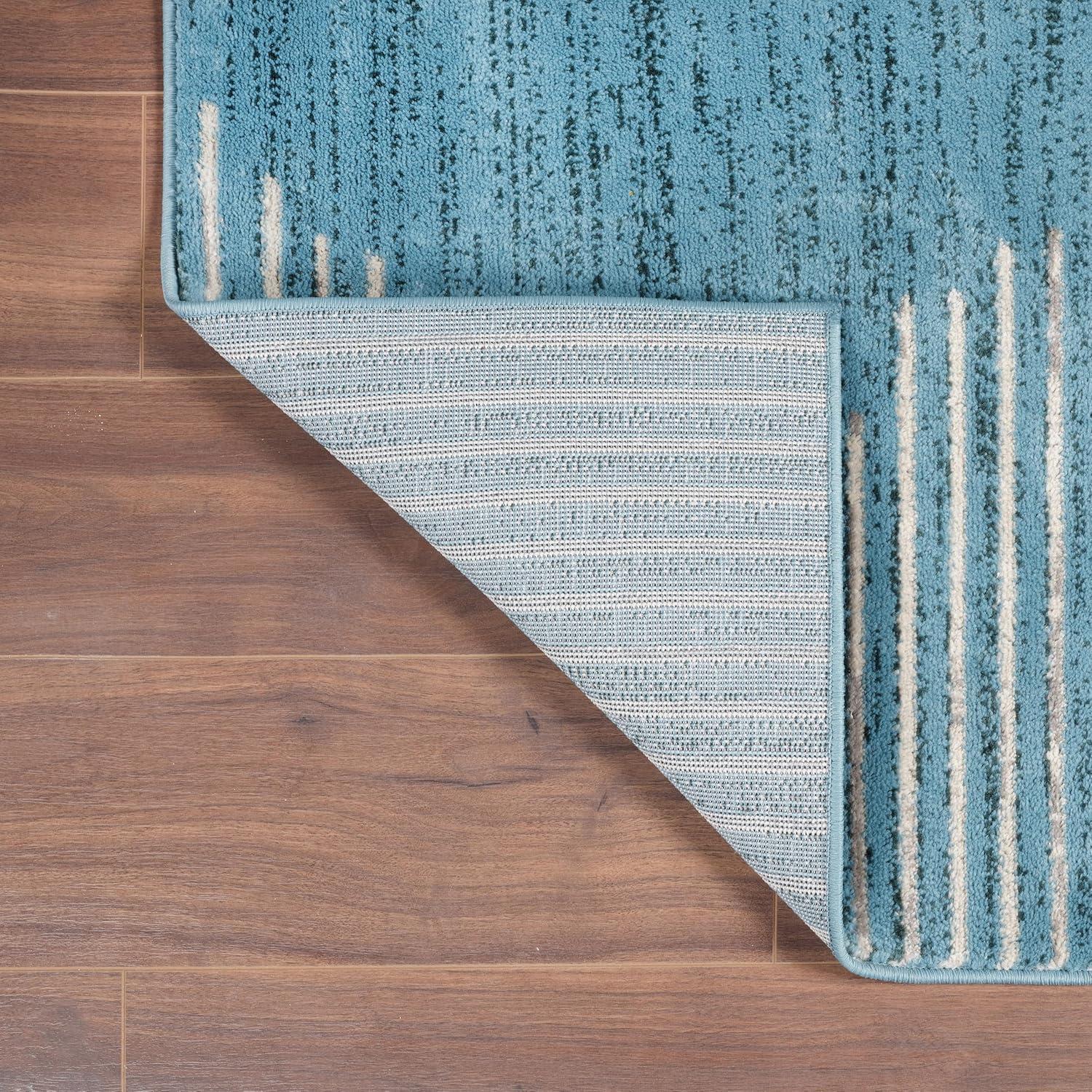 Blue 5' x 7' Geometric Stripe Synthetic Area Rug