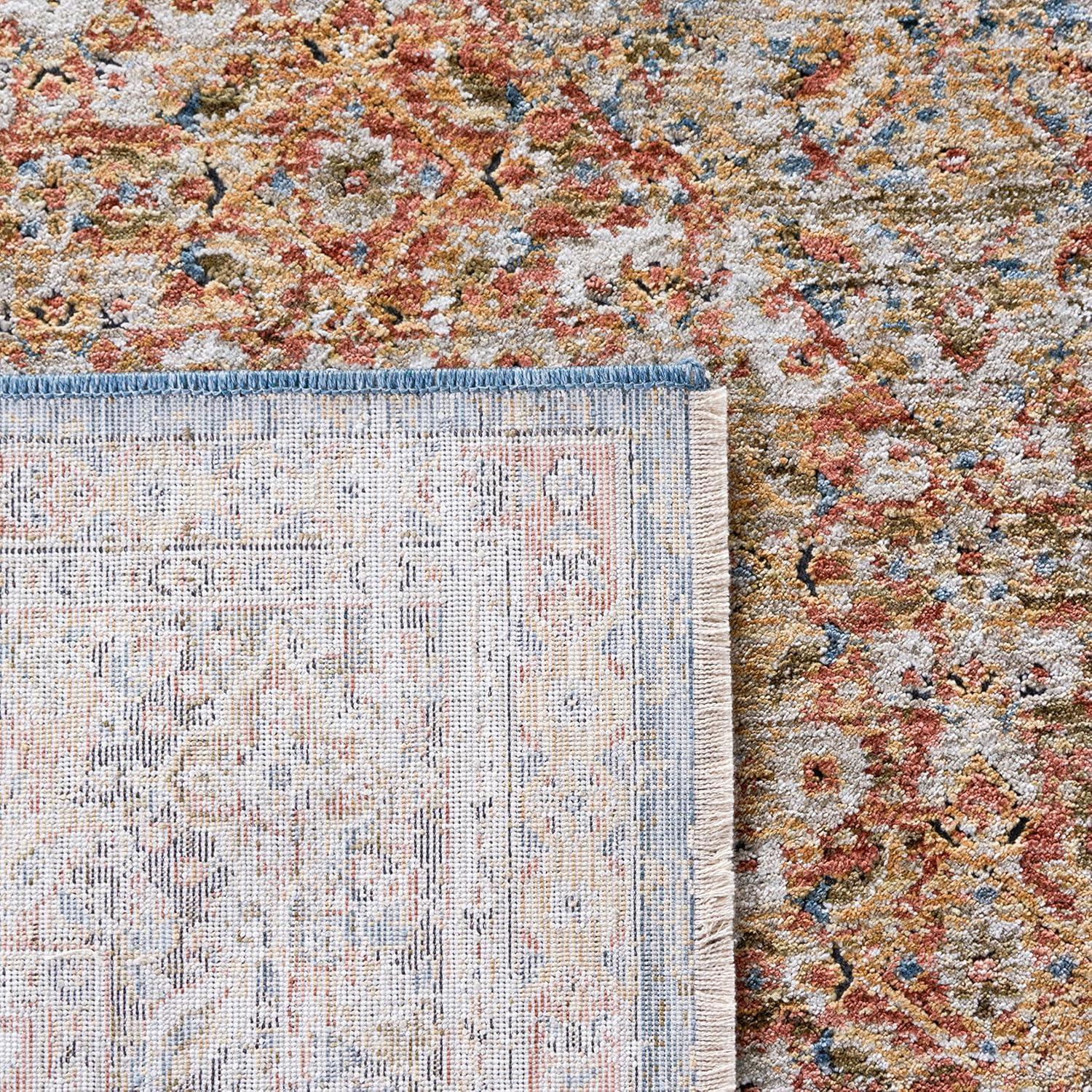 Blue and Rust Synthetic 9' x 12' Vintage Area Rug