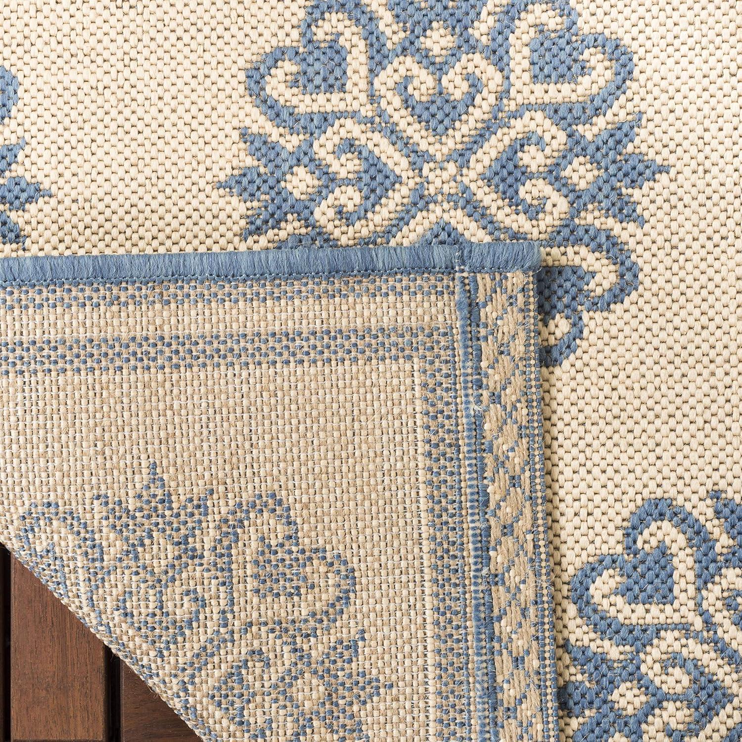 Cream and Blue Geometric Tufted 8' x 10' Synthetic Rug