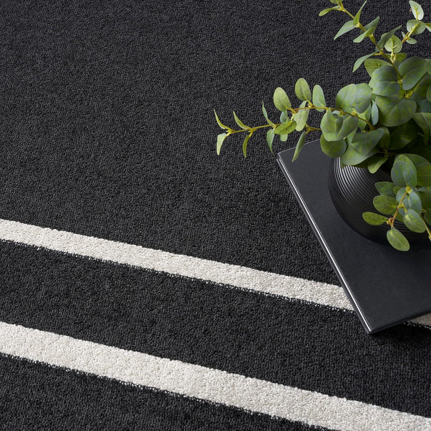 Nourison Essentials 9' x 12' Black Ivory Contemporary Indoor/Outdoor Rug