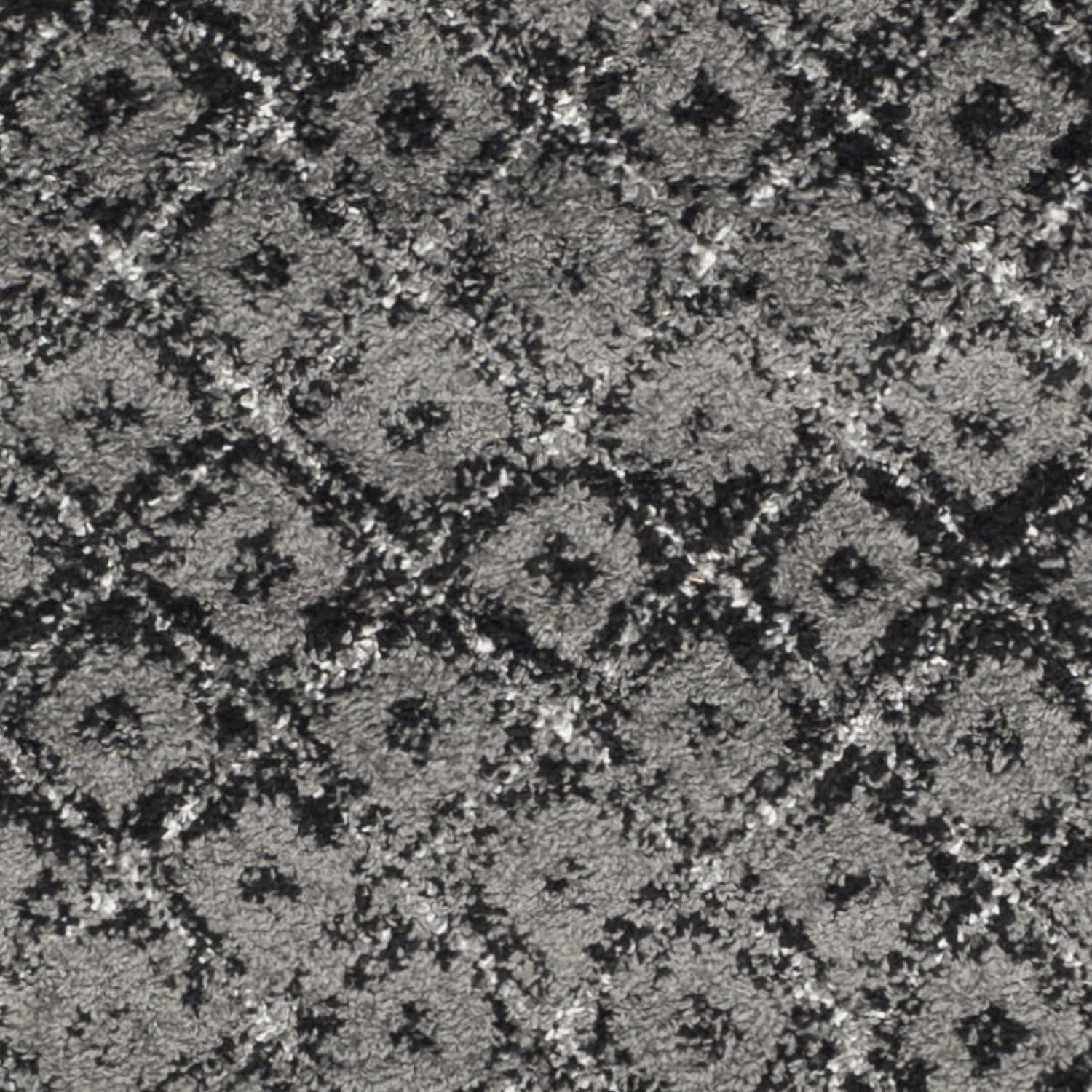 6' x 9' Black and Silver Synthetic Reversible Area Rug