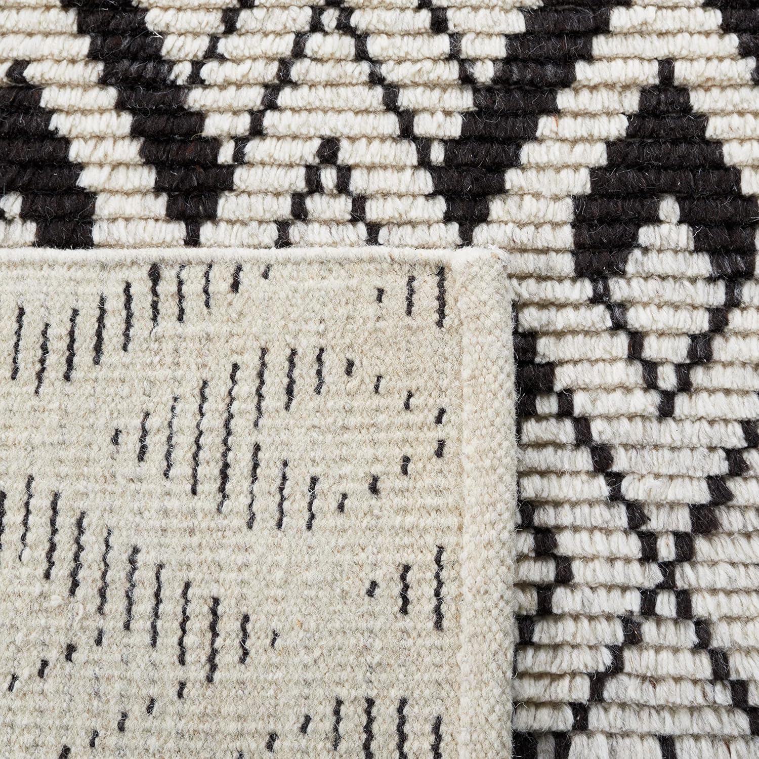 Ivory and Black Hand-Knotted Wool 6' x 9' Area Rug