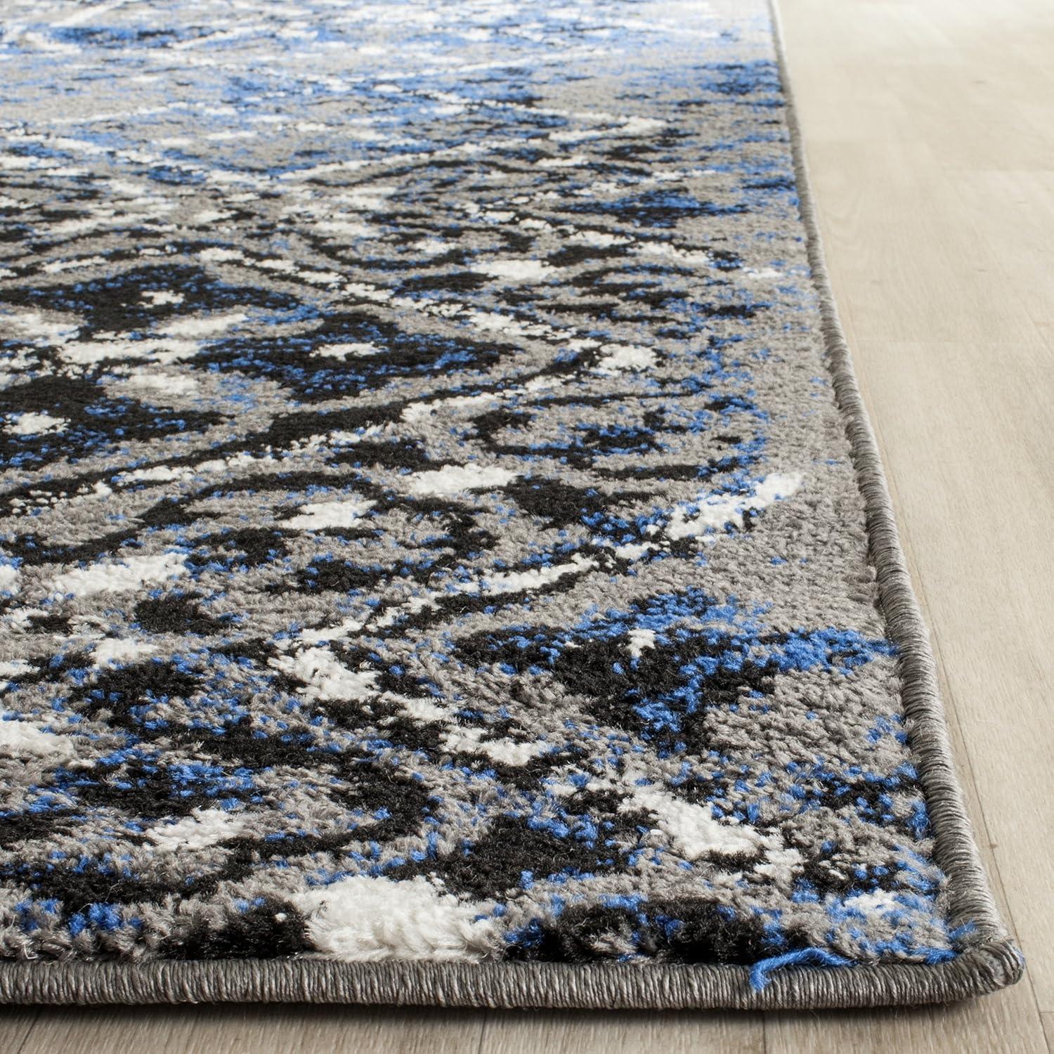 Blue and Silver Geometric 9' x 12' Synthetic Area Rug