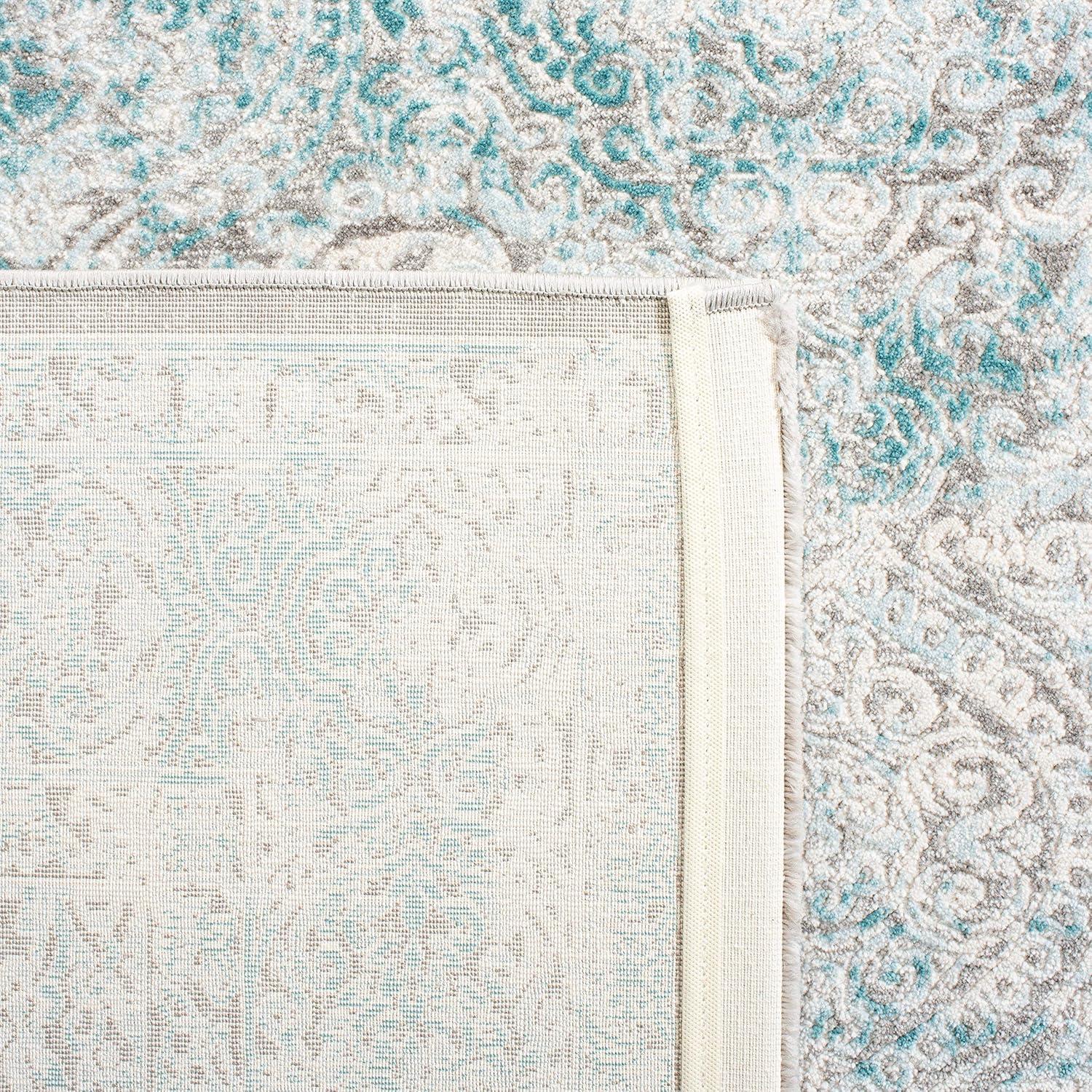 Elysian Ivory & Turquoise 9' x 12' Synthetic Reversible Area Rug