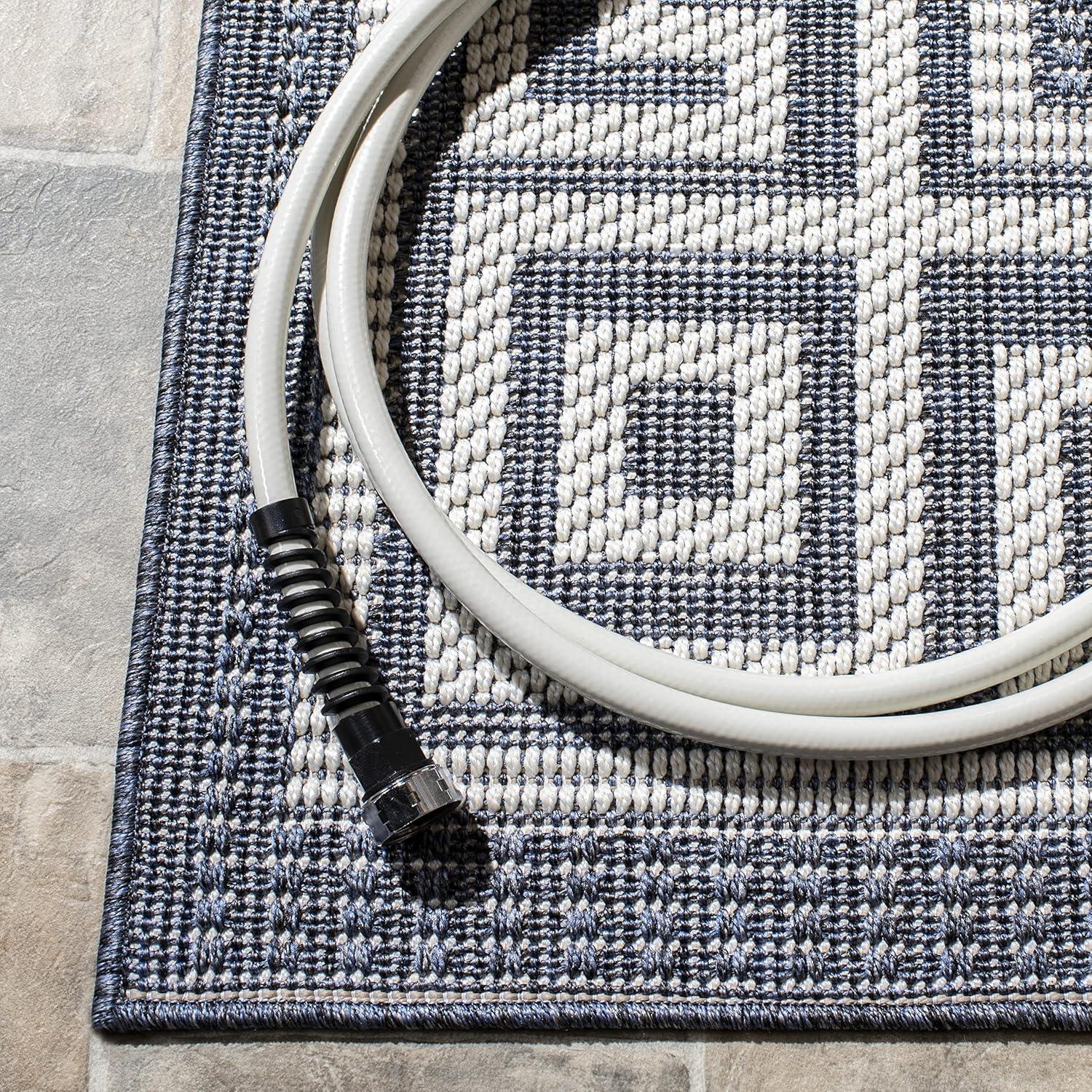 Bermuda BMU820 Power Loomed Indoor/Outdoor Area Rug - Dark Blue/Ivory - 6'7"x9'2" - Safavieh.