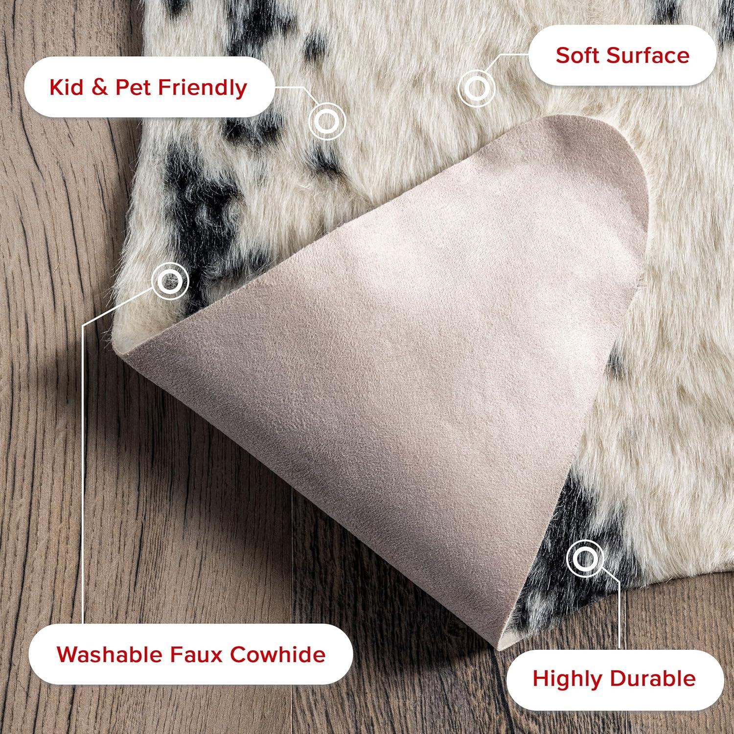 Nuloom Marcia SpinClean Machine Washable Faux Cowhide Area Rug, Shaped 3' 10" x 5', Black