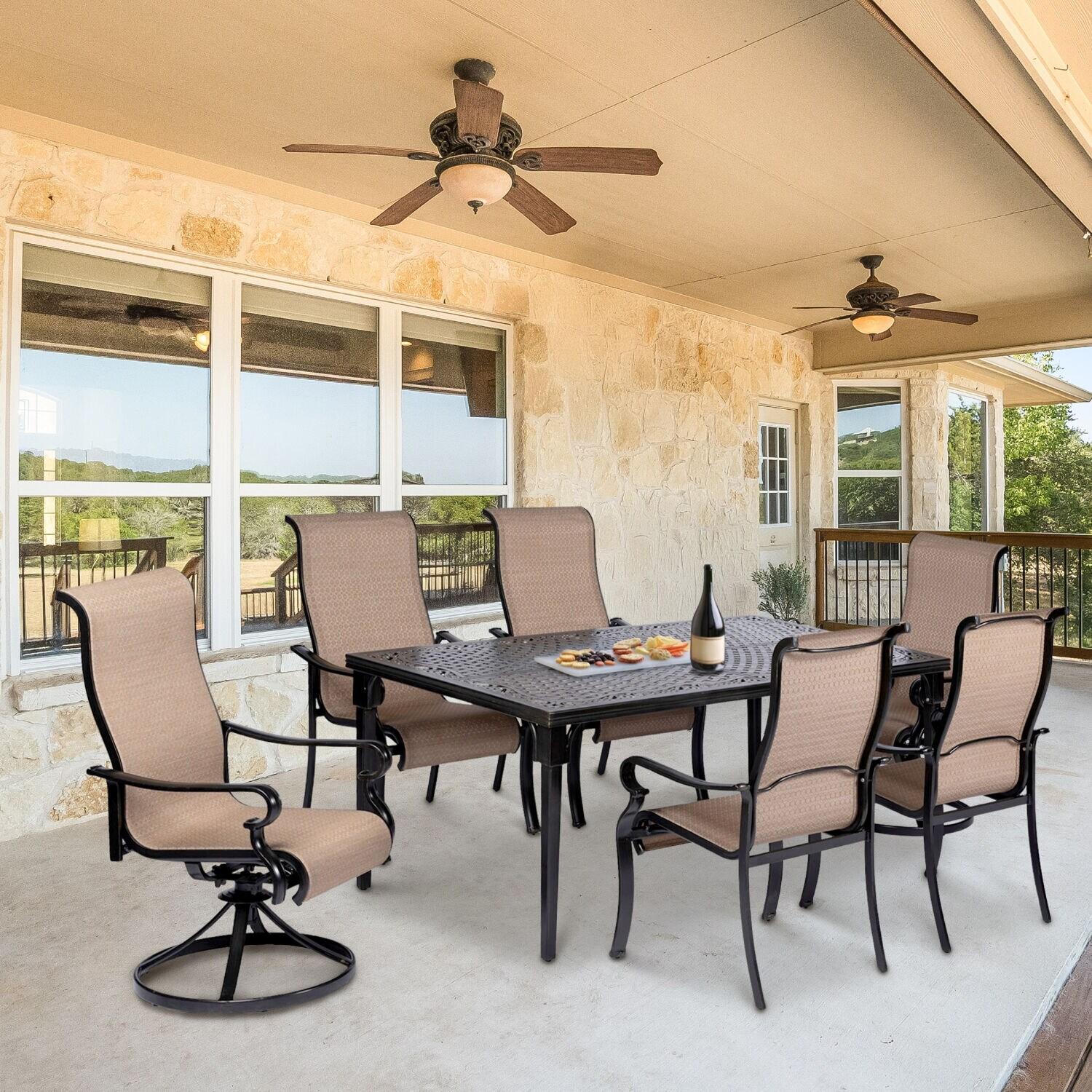 Hanover Brigantine Juego de Comedor Moderno para Exteriores de 7 Piezas / 4 Sillas con Cabestrillo, 2 Balancines Giratorios / Mesa con Tapa de 40'' x 70'' / Clima, Xido, Resistente a UV / Bronceado / BRIGDN7PCSW-2