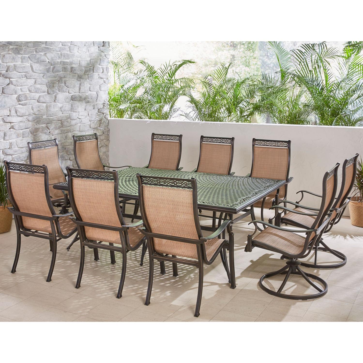 Hanover Manor 11-Piece Outdoor Dining Set in Cedar with 4 Contoured Swivel Rockers, 6 Contoured Chairs, and 60" x 84" Cast-Top Table