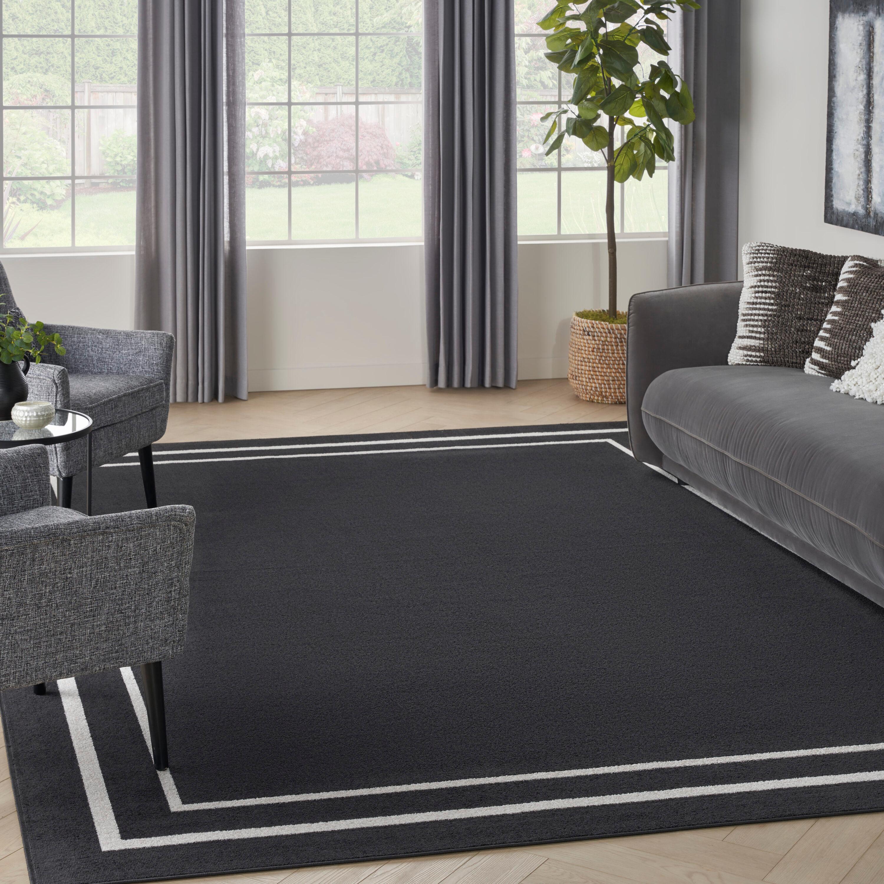 Nourison Essentials 9' x 12' Black Ivory Contemporary Indoor/Outdoor Rug