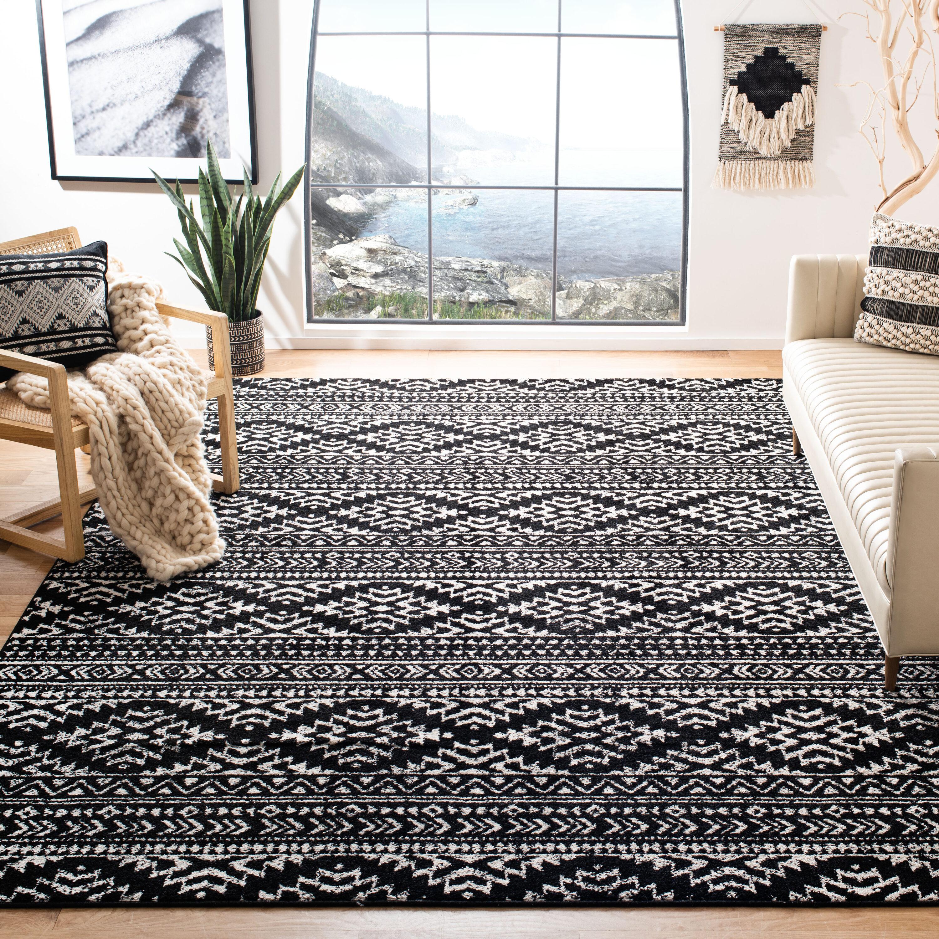 SAFAVIEH Tulum Lakisha Distressed Southwestern Area Rug, 10' x 13', Black/Ivory