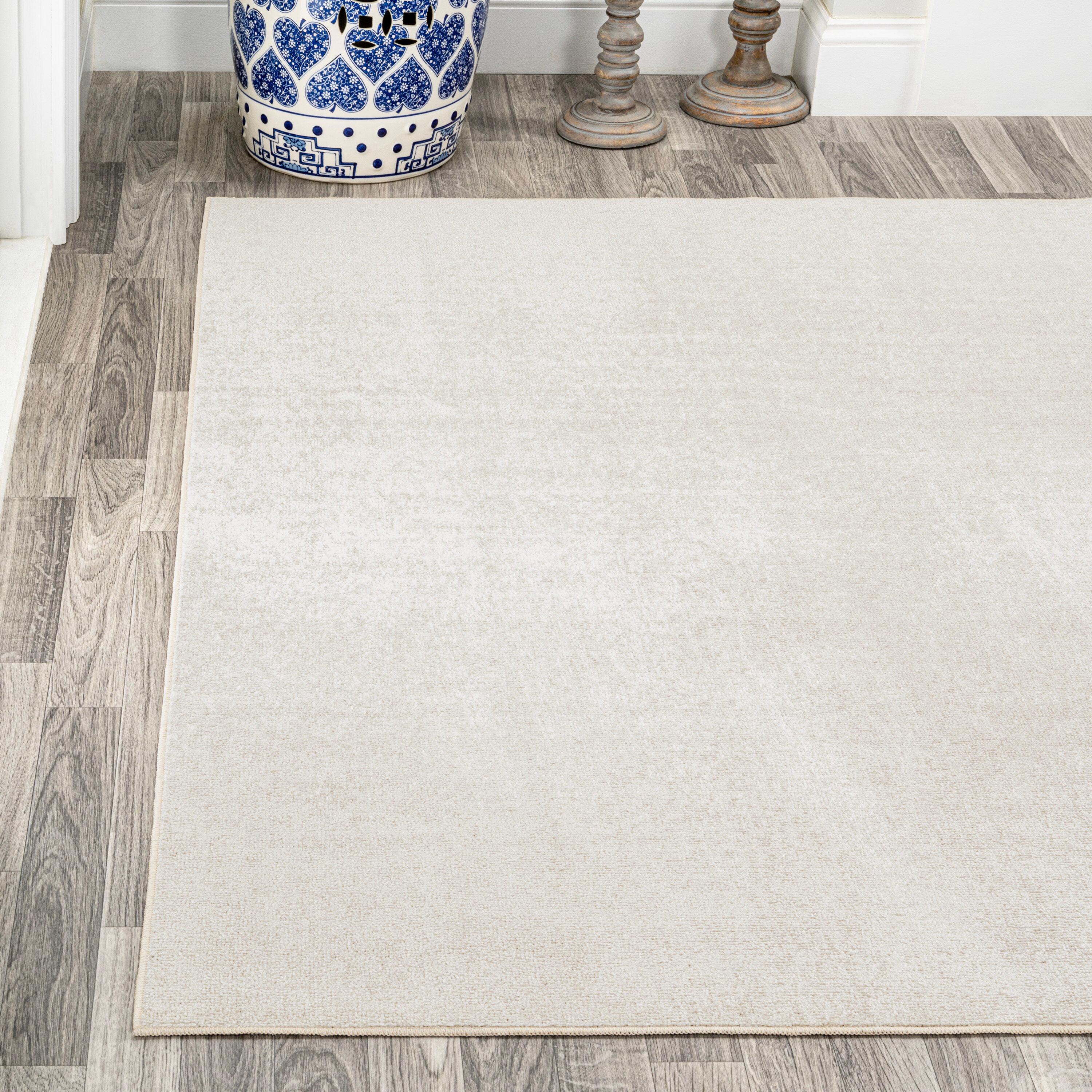 JONATHAN Y Twyla Classic Solid Low-Pile Machine-Washable Cream 4 ft. x 6 ft. Area Rug