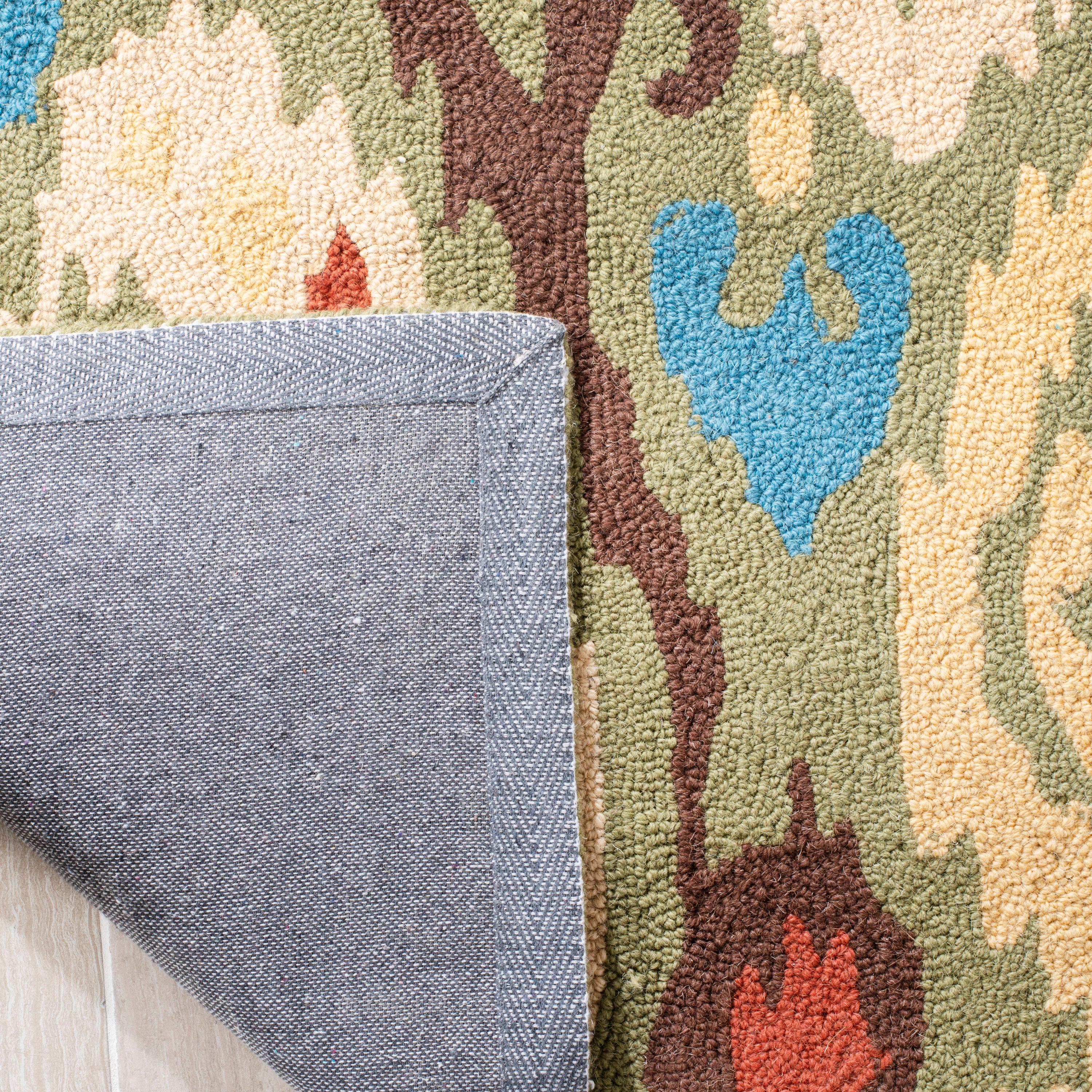 SAFAVIEH Chelsea Landen Southwestern Wool Area Rug, Green/Multi, 5'3" x 8'3"