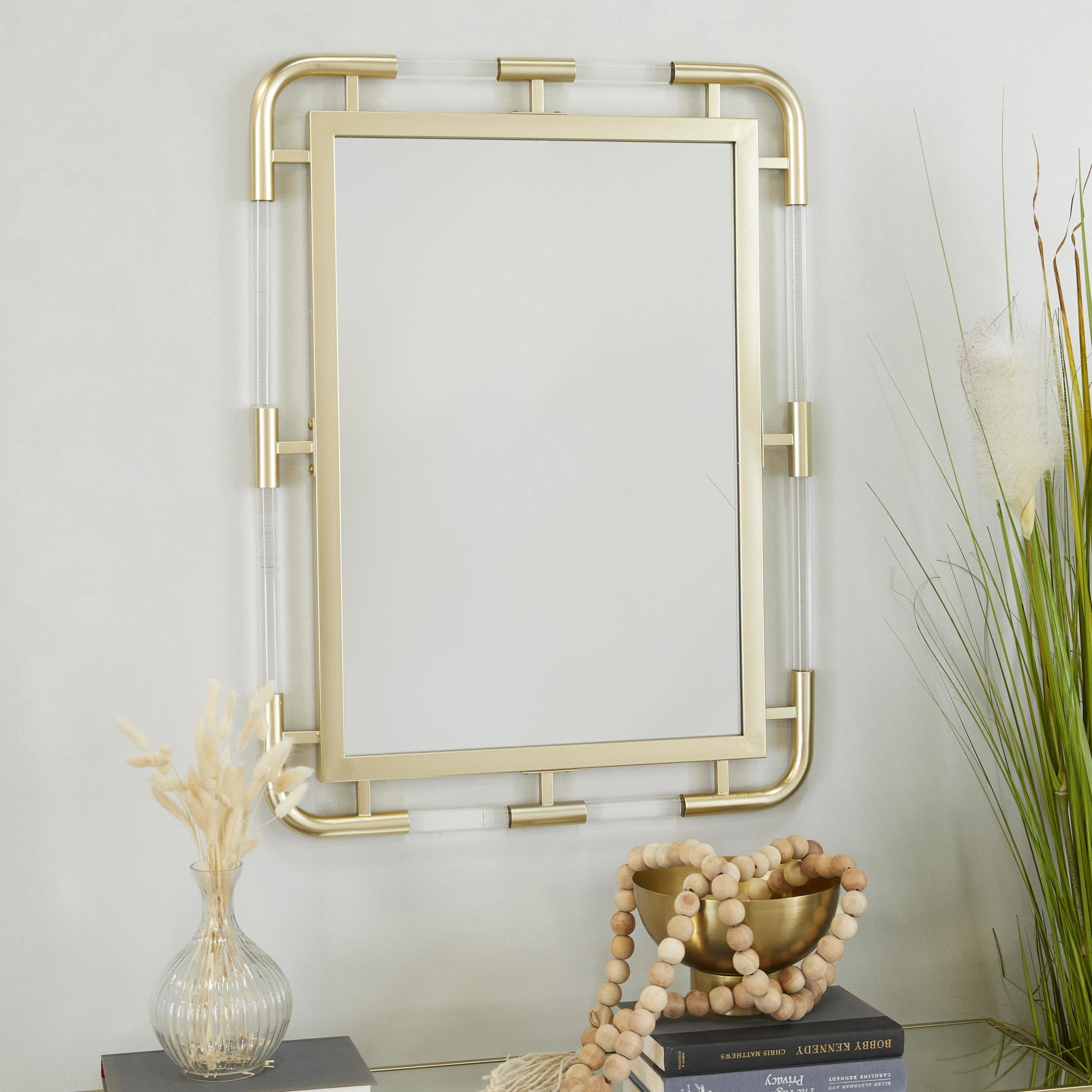CosmoLiving by Cosmopolitan 24" x 32" Gold Wall Mirror with Acrylic Details