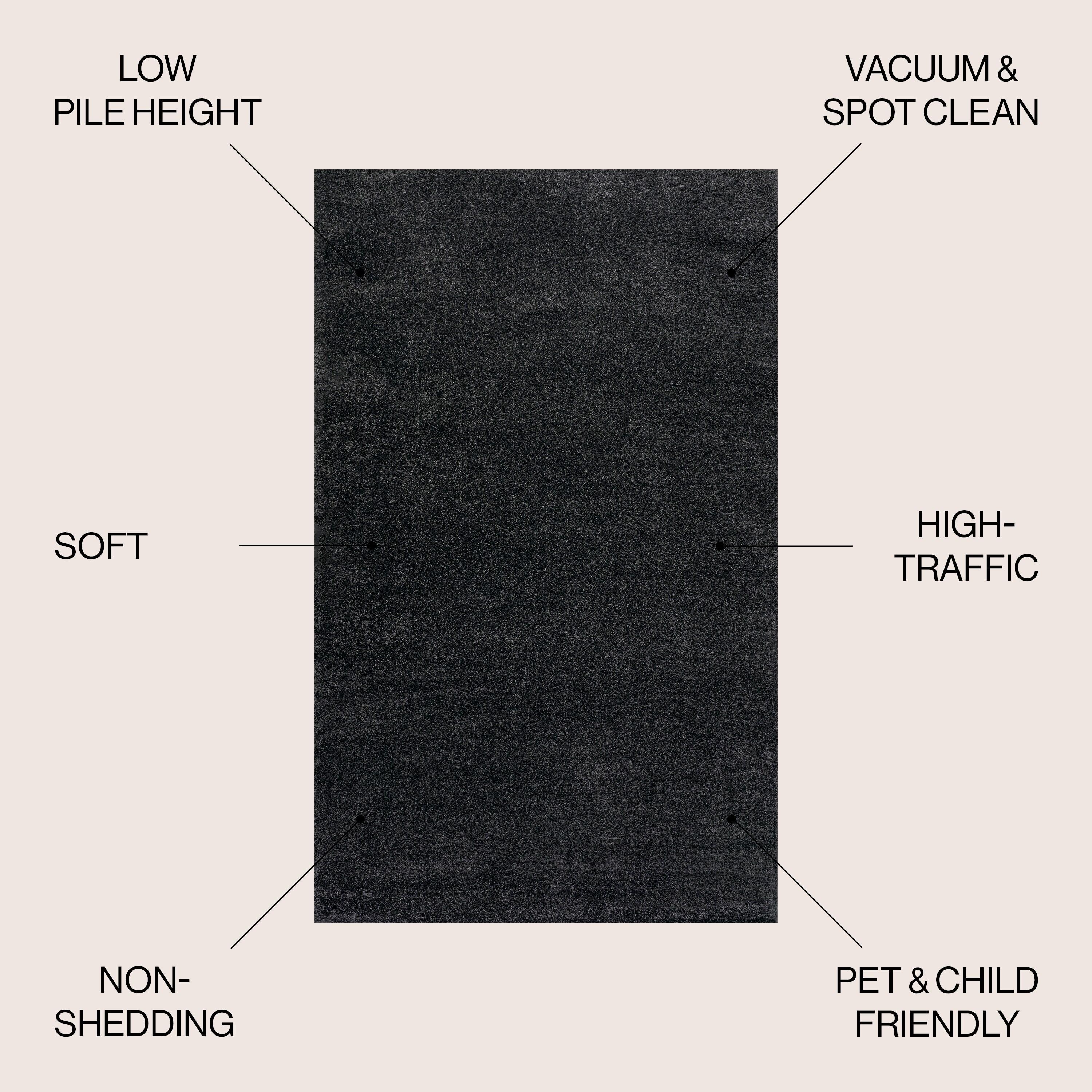 9' x 12' Haze Solid Low-Pile Area Rug, Black - JONATHAN Y